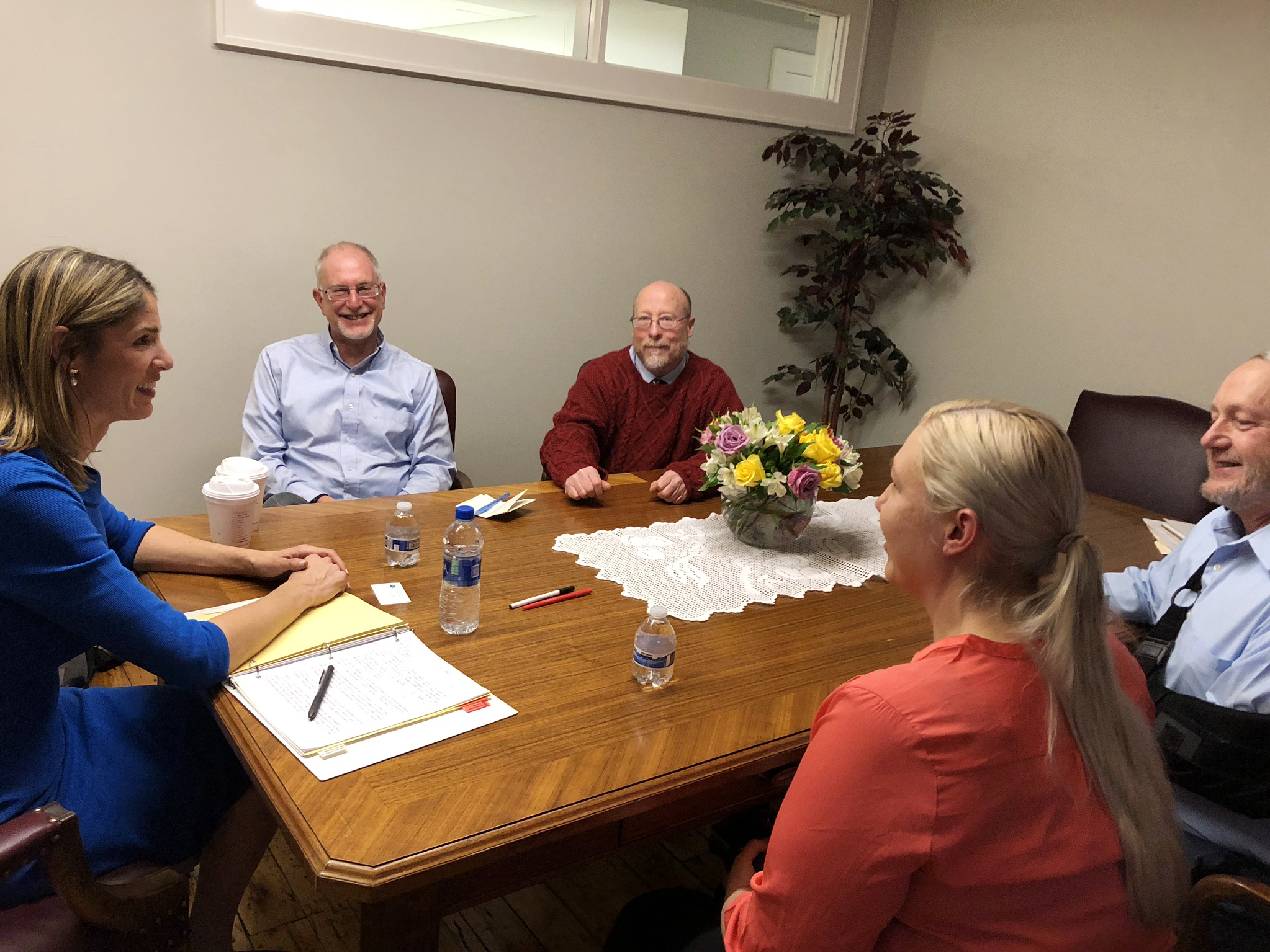 Rep. Lori Trahan (left), D-Mass., meets with furloughed EPA employees seeking help at her district office in Lowell.