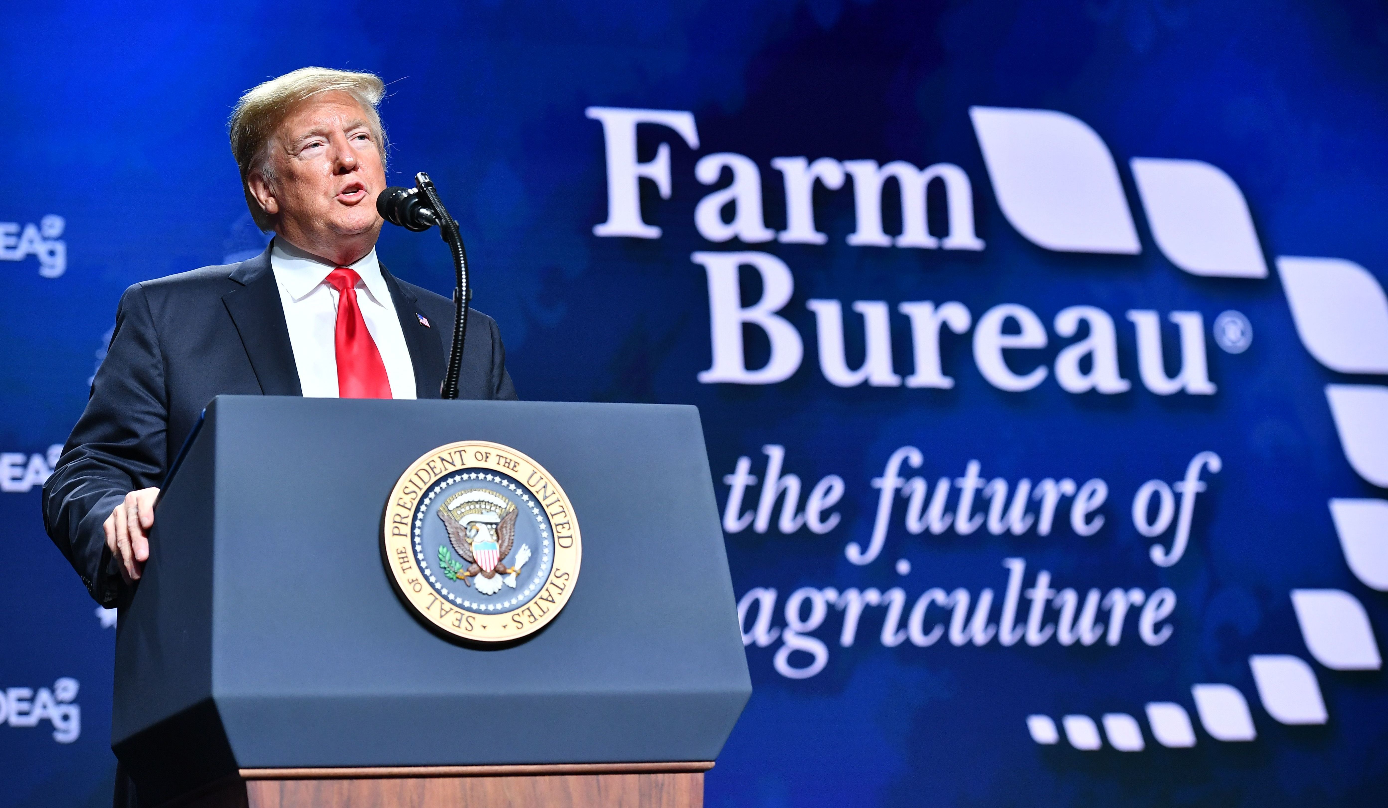 President Trump addresses the annual American Farm Bureau Federation convention in New Orleans on Monday. (AFP/Getty Images)