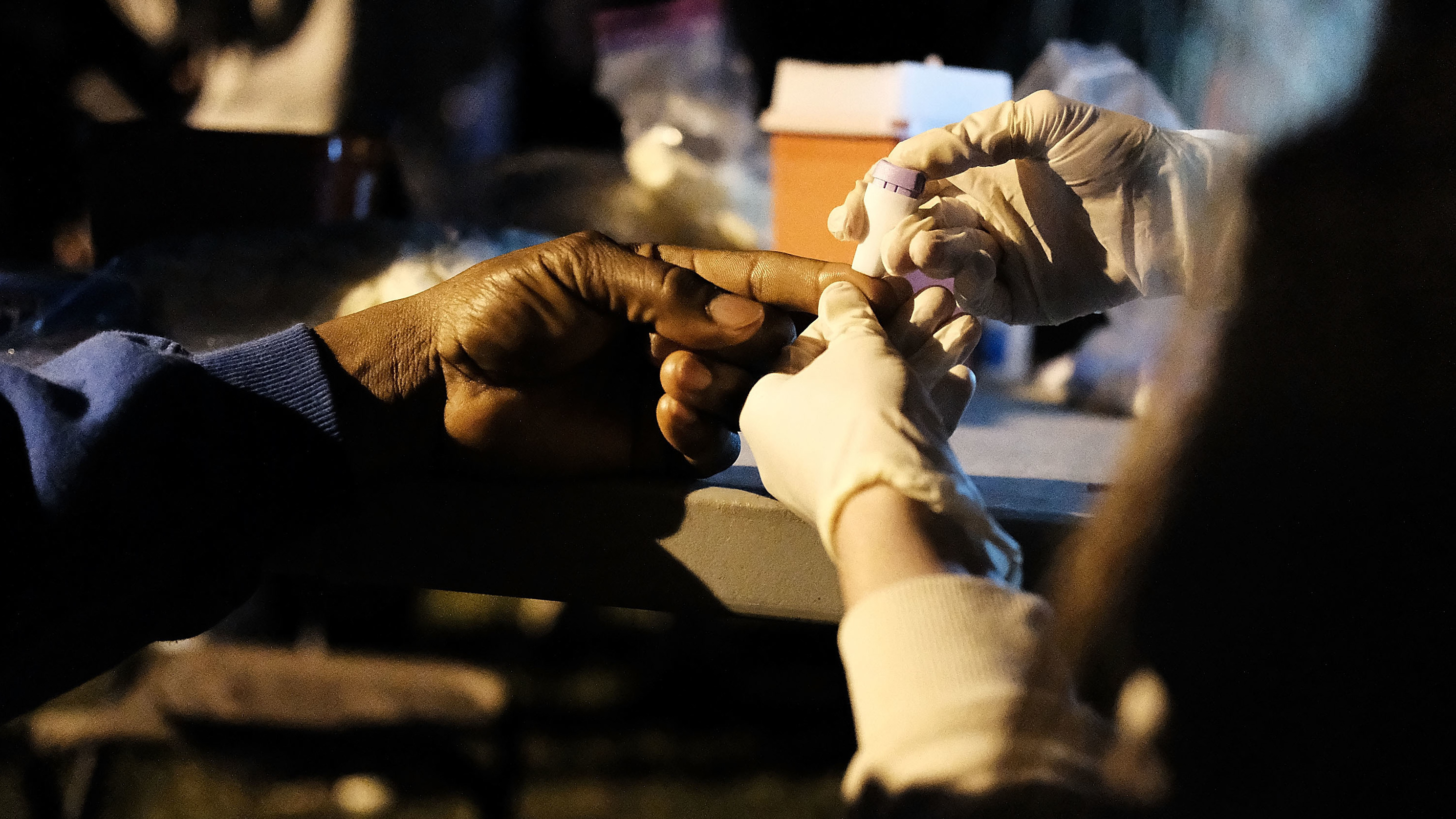 A migrant worker in a Connecticut apple orchard gets a medical checkup in 2017. A proposed rule by the Trump administration that would prohibit some immigrants who get Medicaid from working legally has already led to a lot of fear and reluctance to sign up for medical care, doctors say. (Getty Images)
