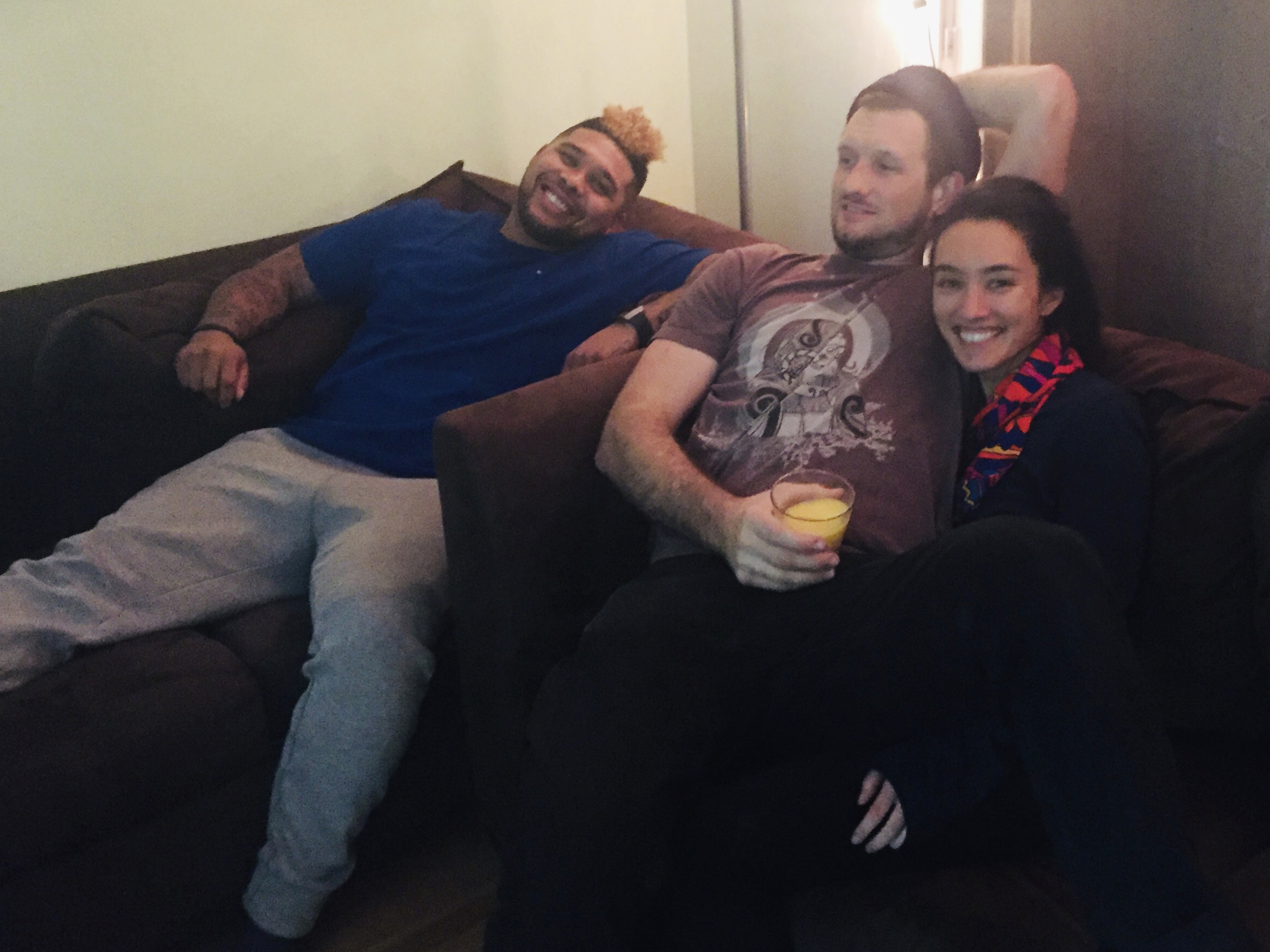 Jason Jones (left) with his roommates Joe Klein and Tamiko Panzella in their Oakland, Calif., apartment. Panzella and Klein are participating in a new program to provide housing to former inmates. Jones was released recently after nearly 14 years in prison. (Courtesy of Tamiko Panzella)
