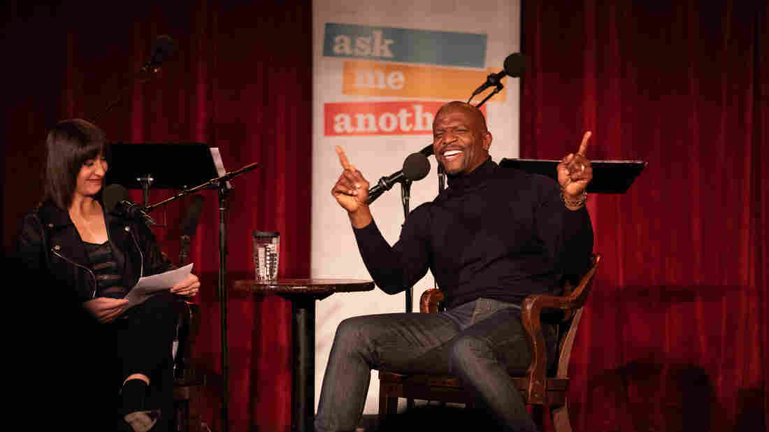 Host Ophira Eisenberg chats with Terry Crews on Ask Me Another at the Bell House in Brooklyn, New York.