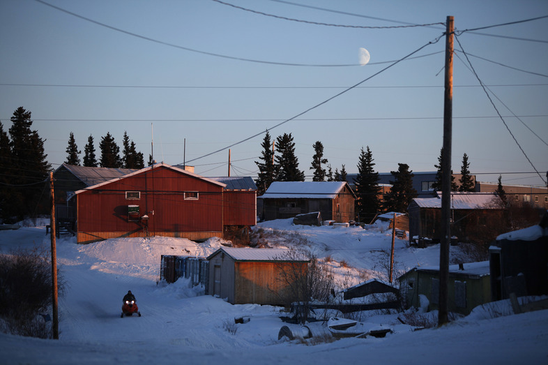 The moon hangs low in the sky over the remote Inupiat Eskimo village of Noorvik, Alaska, the first community in the U.S. counted for the 2010 census. (Carolyn Kaster/AP)