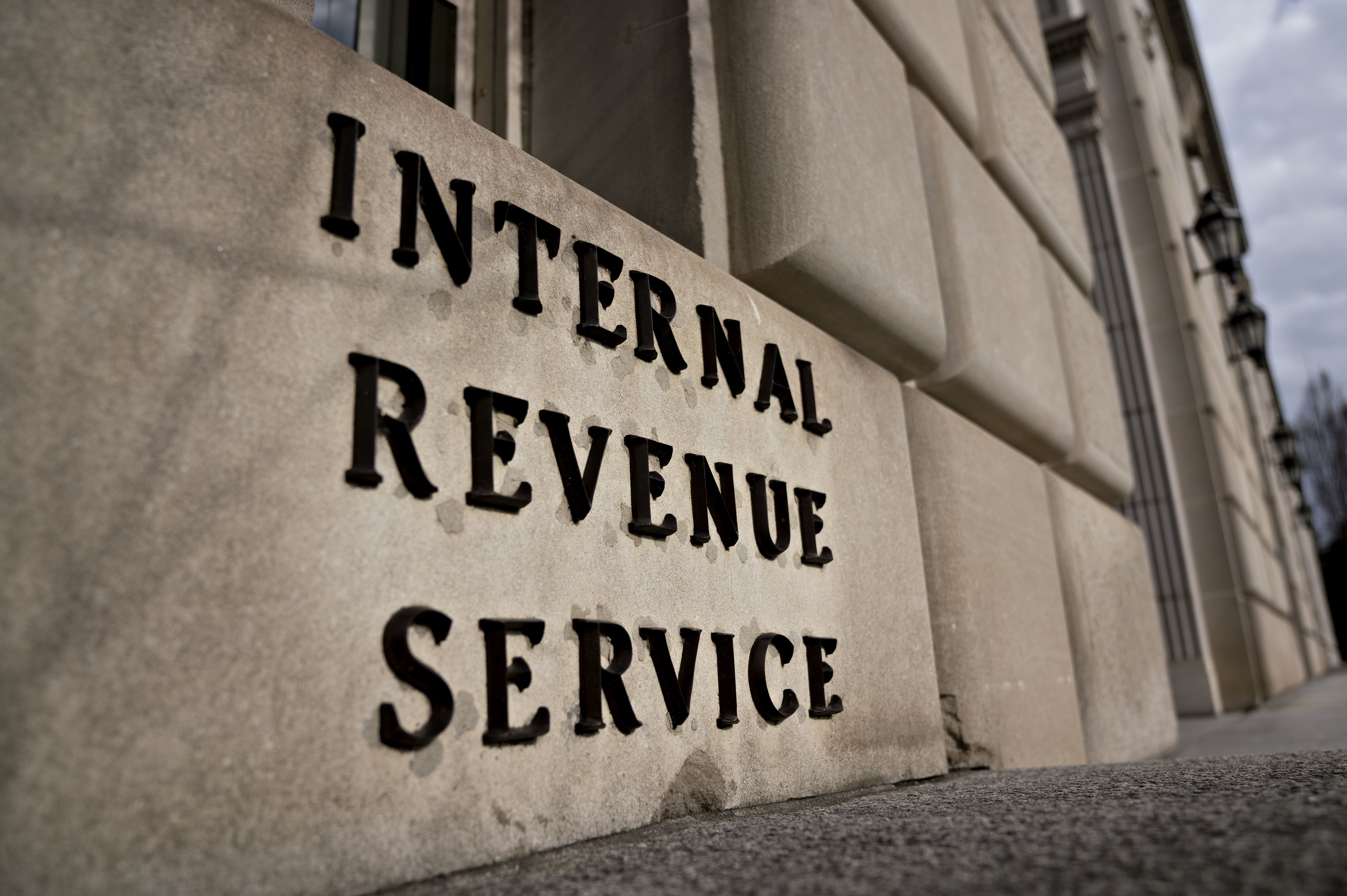 Tax season is more stressful this year for filers and IRS workers alike, because of new tax law changes and the partial government shutdown that has left the agency with roughly half its normal staff. (Bloomberg via Getty Images)