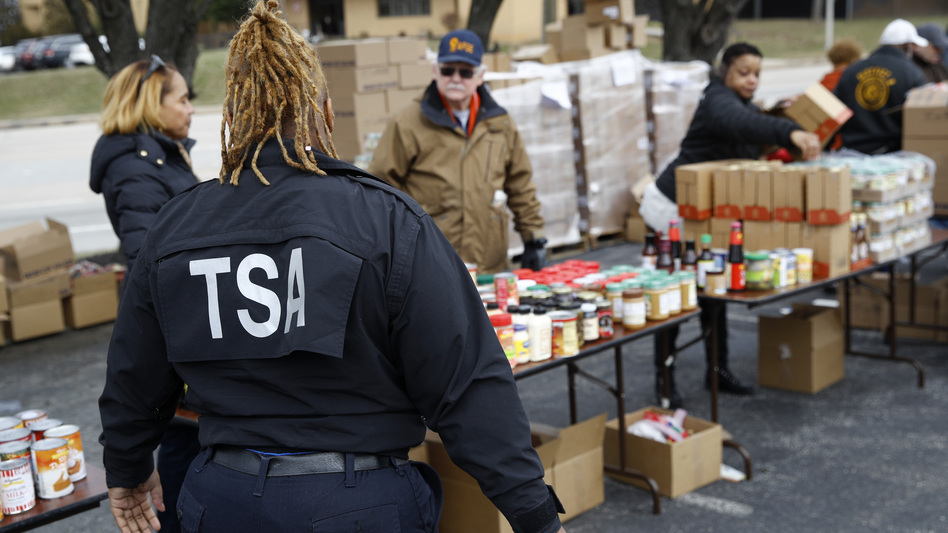 A TSA employee visits a Baltimore food pantry for government workers affected by the federal shutdown. (Patrick Semansky/AP)