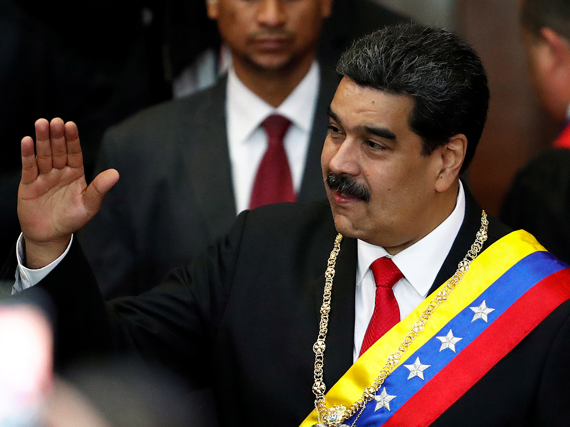 Venezuela's sitting president, Nicolás Maduro, attends a ceremony Thursday in Caracas to mark the opening of the judicial year at the Supreme Court of Justice. Opposition leader Juan Guaidó has declared himself the interim president, but Maduro has not ceded power. (Reuters)