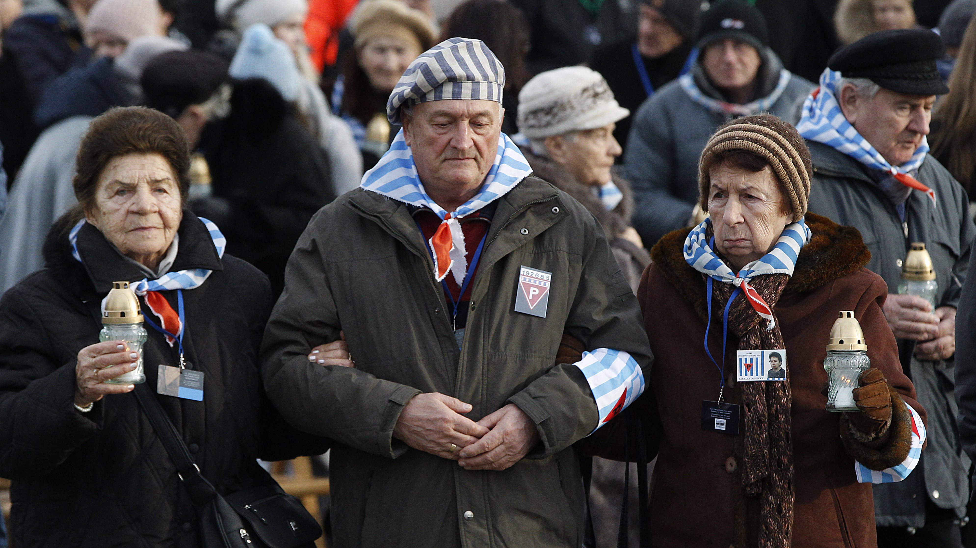 Survivors of Auschwitz at the former concentration camp Sunday.