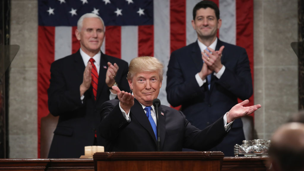 President Trump delivers the State of the Union address in January 2018 as Vice President Pence and then-Speaker of the House Paul Ryan look on in the chamber of the House of Representatives. (AFP/Getty Images)