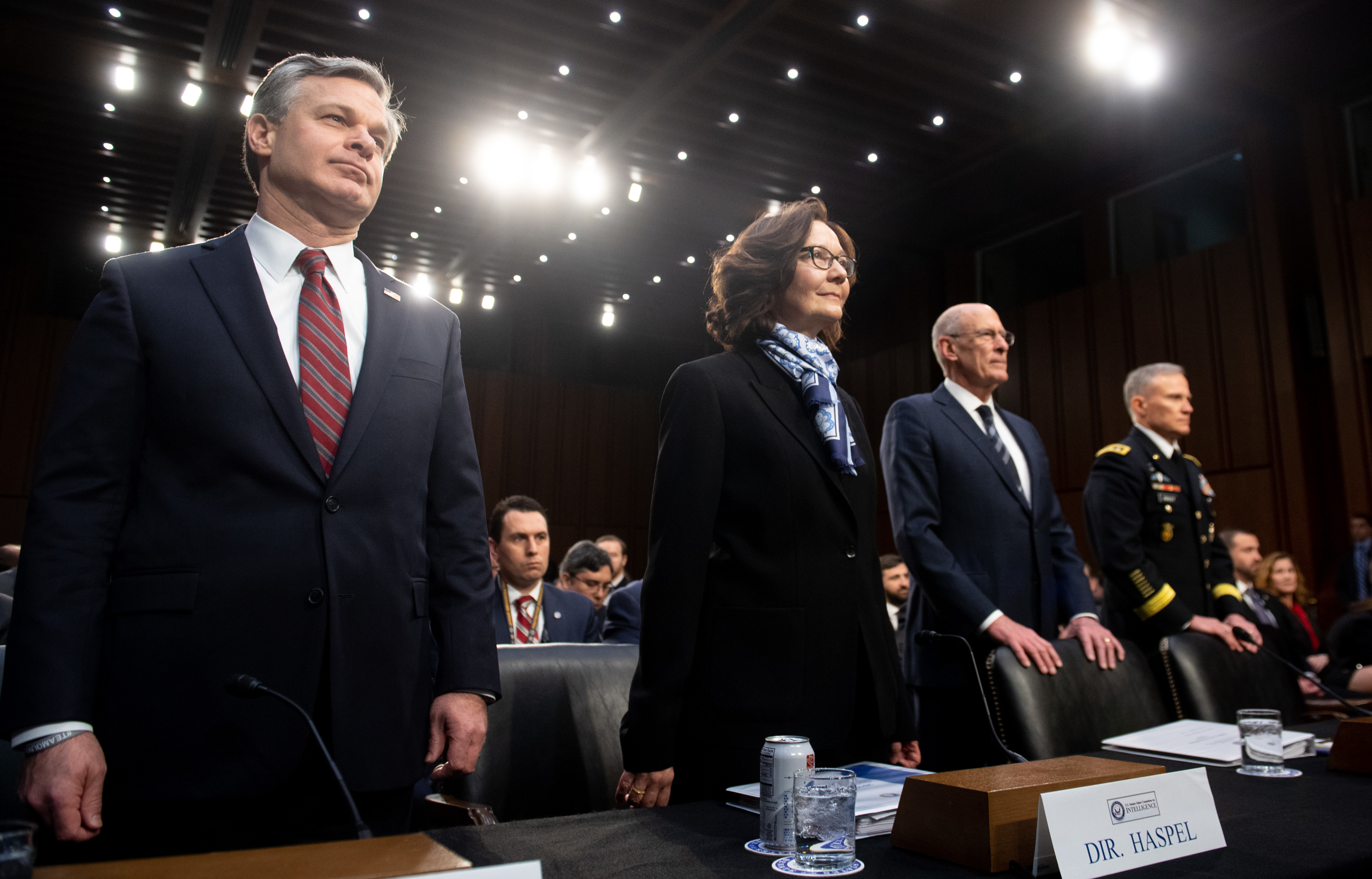 FBI Director Christopher Wray (from left), CIA Director Gina Haspel, Director of National Intelligence Dan Coats and Lt. Gen. Robert Ashley, director of the Defense Intelligence Agency, arrive to testify before the Senate intelligence committee on Capitol Hill on Tuesday. (AFP/Getty Images)