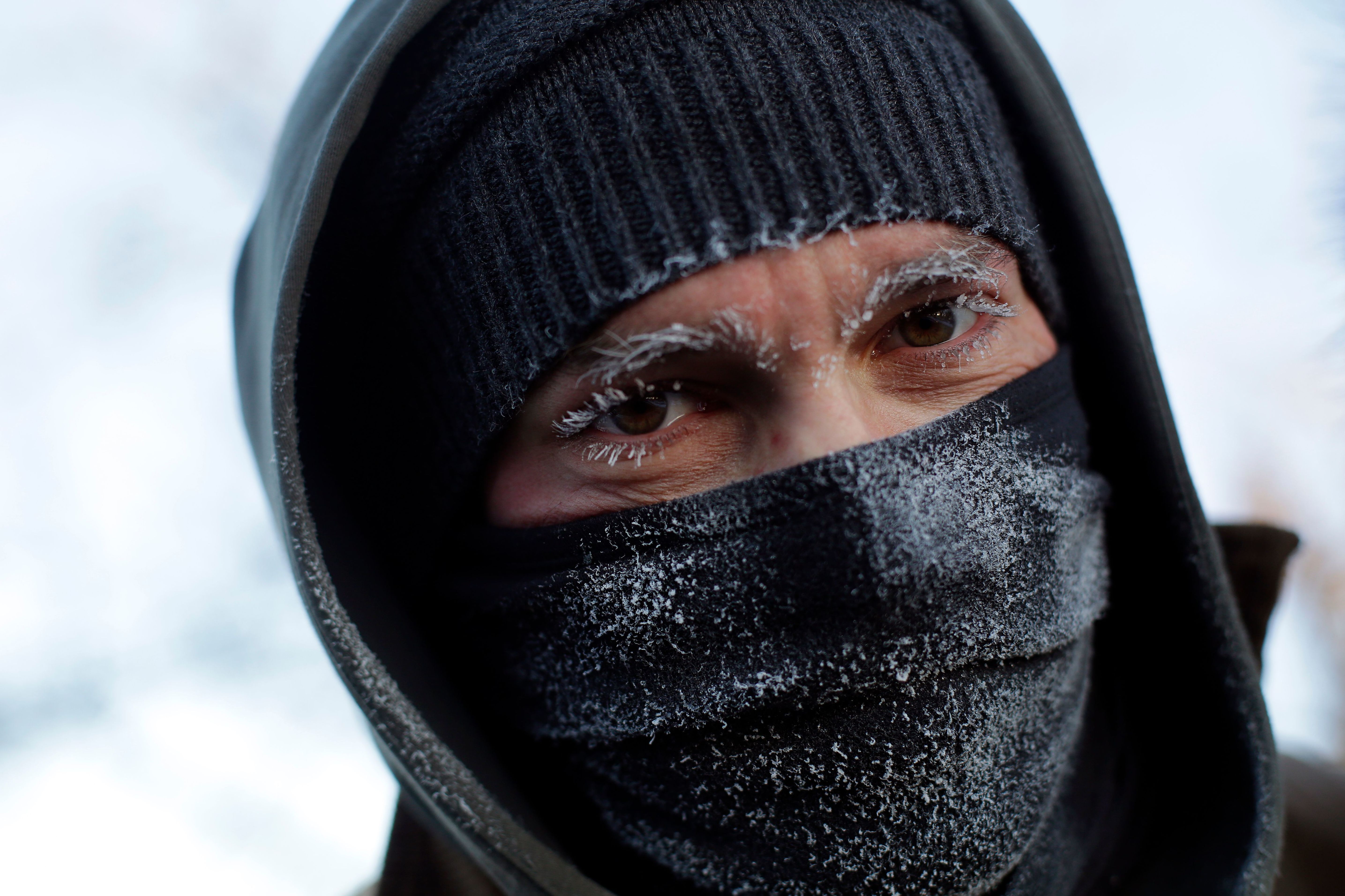 Frank Lettiere's eyebrows and eyelashes froze after his walk along Lake Michigan's Chicago shoreline Wednesday. Frostbite warnings were issued for parts of the U.S. Midwest as temperatures plunged. (AFP/Getty Images)