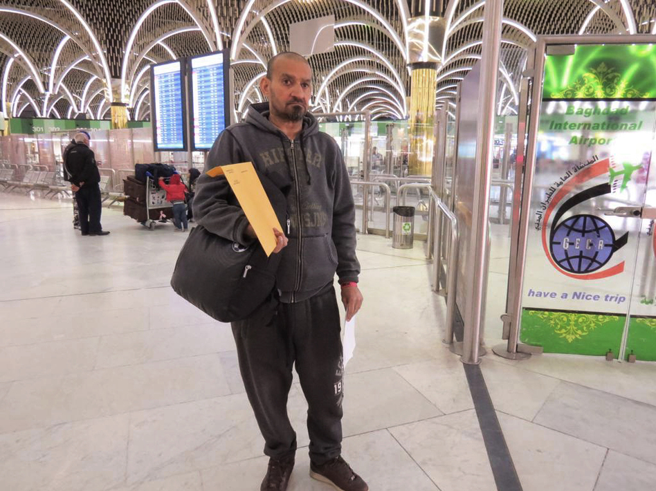 Muneer Subaihani at the airport in Baghdad on Tuesday, waiting to board the first of his flights back to the United States. (Ahmed Qusay for NPR)