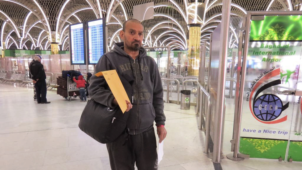 Muneer Subaihani at the airport in Baghdad on Tuesday, waiting to board the first of his flights back to the United States.