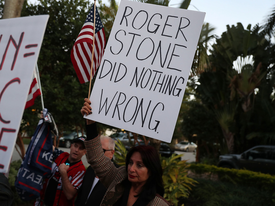 Cindy Falco di Corrado joins with others to show their support for Roger Stone, a longtime adviser to President Trump. A number of Republicans have raised concerns about the way Stone was arrested at his home on Jan. 25. (Joe Raedle/Getty Images)