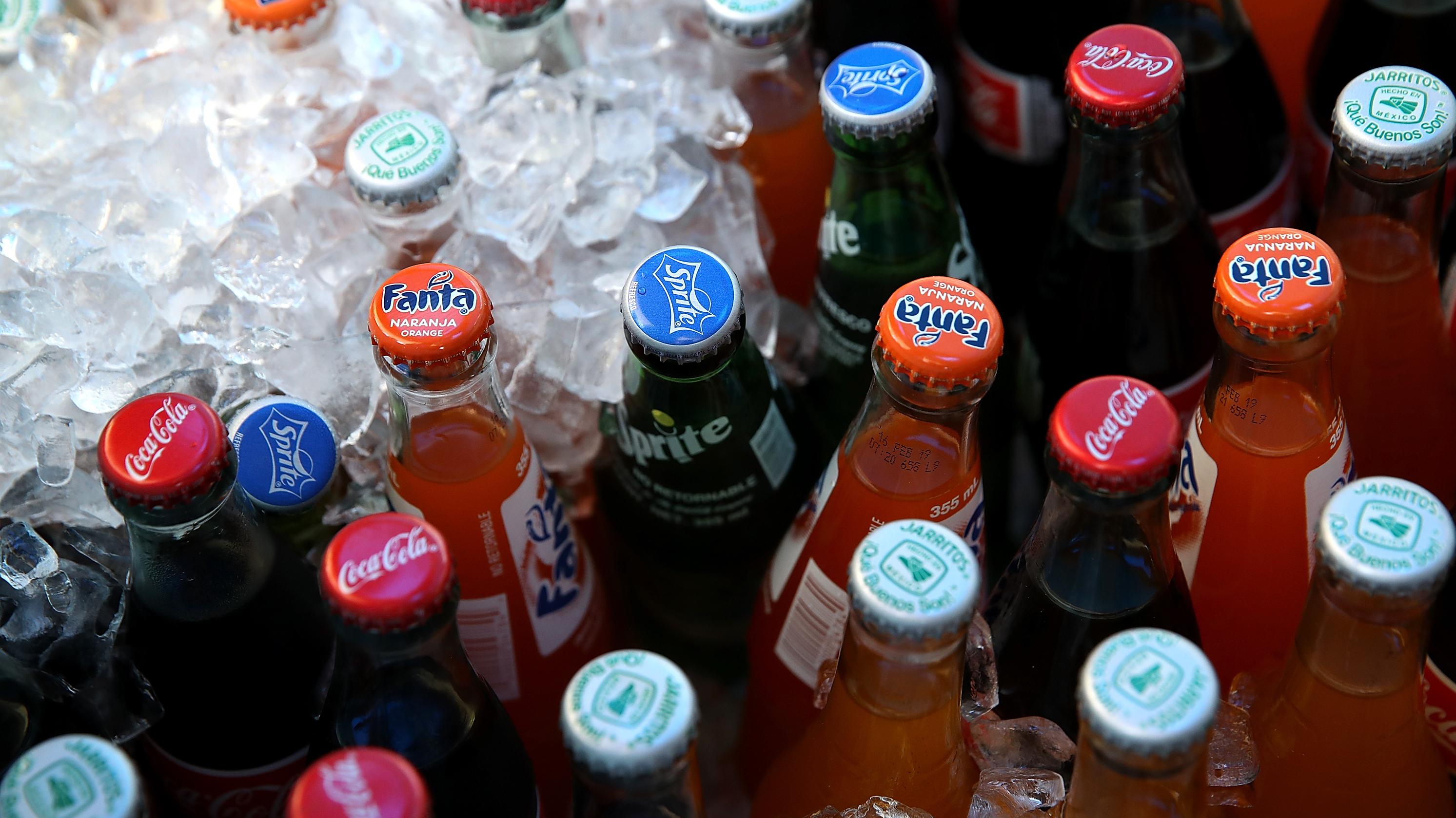 Soda bottles displayed in a San Francisco market.A federal appeals court blocked a city law requiring advertisement warnings on the potential health impacts of sugary drinks.