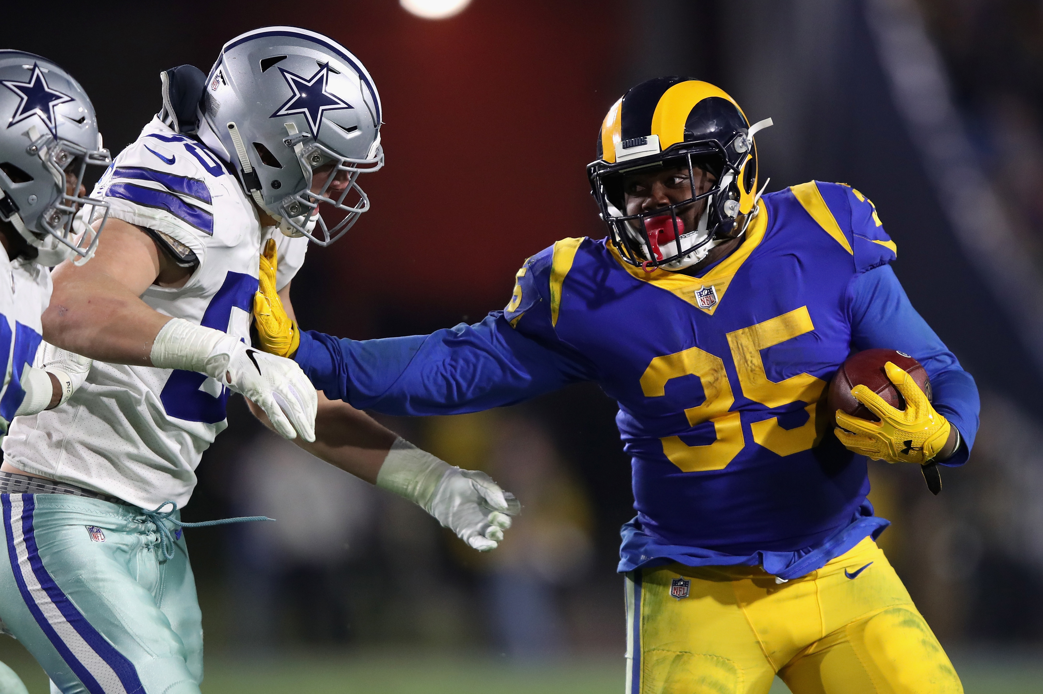 C.J. Anderson of the Los Angeles Rams runs the ball during the NFC Divisional Playoff game on Jan. 12, 2019.