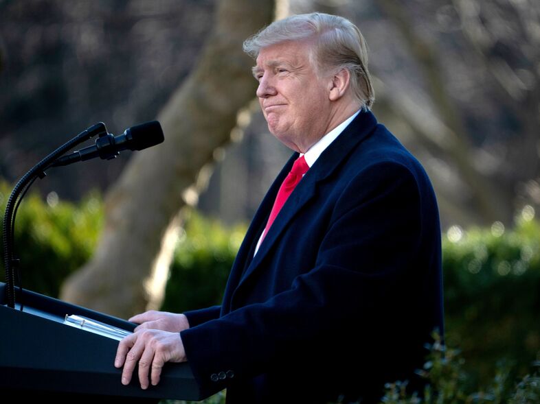 President Trump speaks on a deal to end the partial government shutdown last month. While Trump is expected to maintain his demand for border wall funding in his State of the Union speech, he is also expected to mention issues that carry bipartisan support. (Brendan Smialowski/AFP/Getty Images)