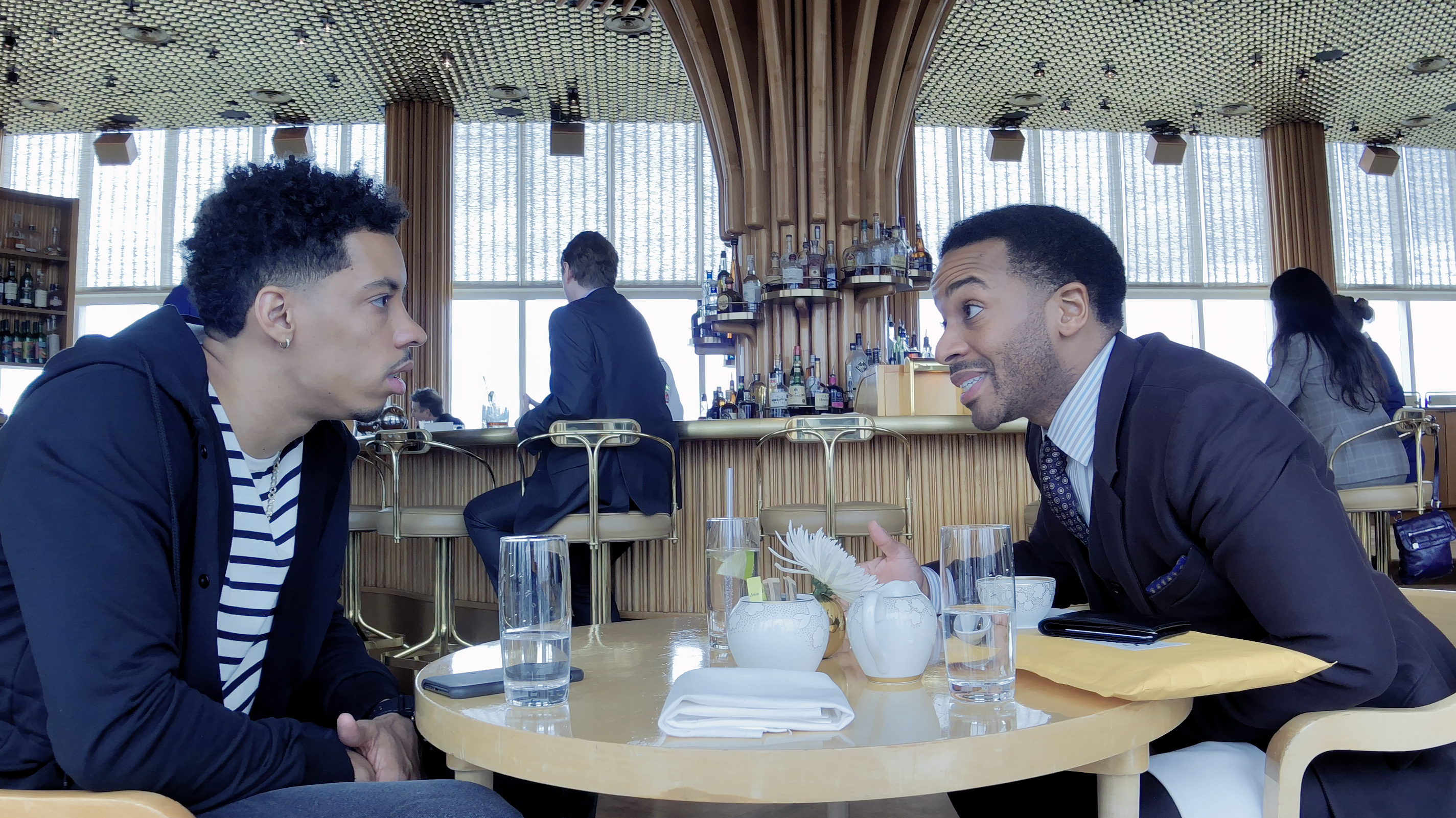 Melvin Gregg as Erick Scott and André Holland as Ray Burke in High Flying Bird, directed by Steven Soderbergh.