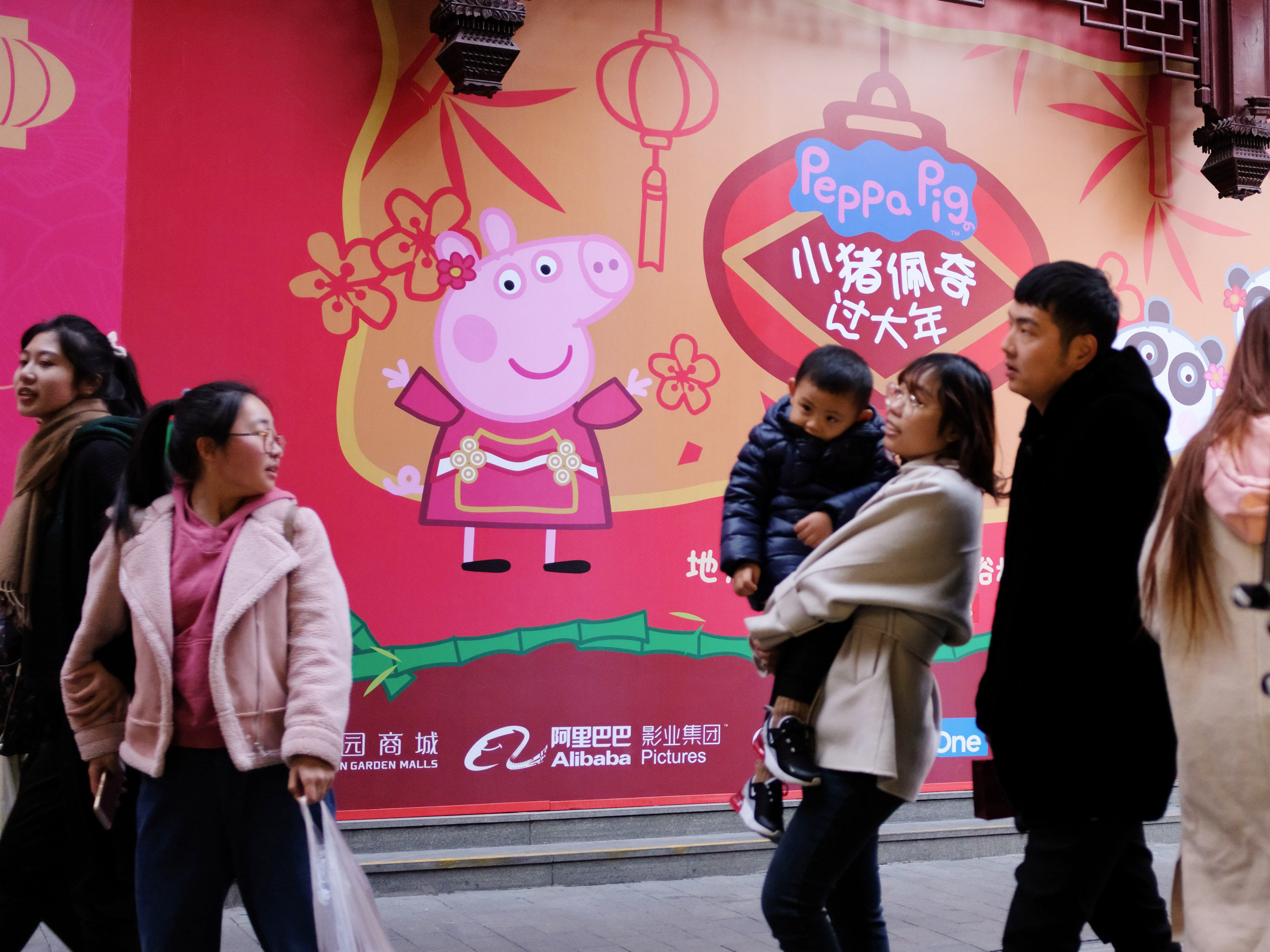 People walk past a Peppa Pig pop-up shop in the Yu Yuan gardens, a popular tourist spot in Shanghai. (AFP/Getty Images)