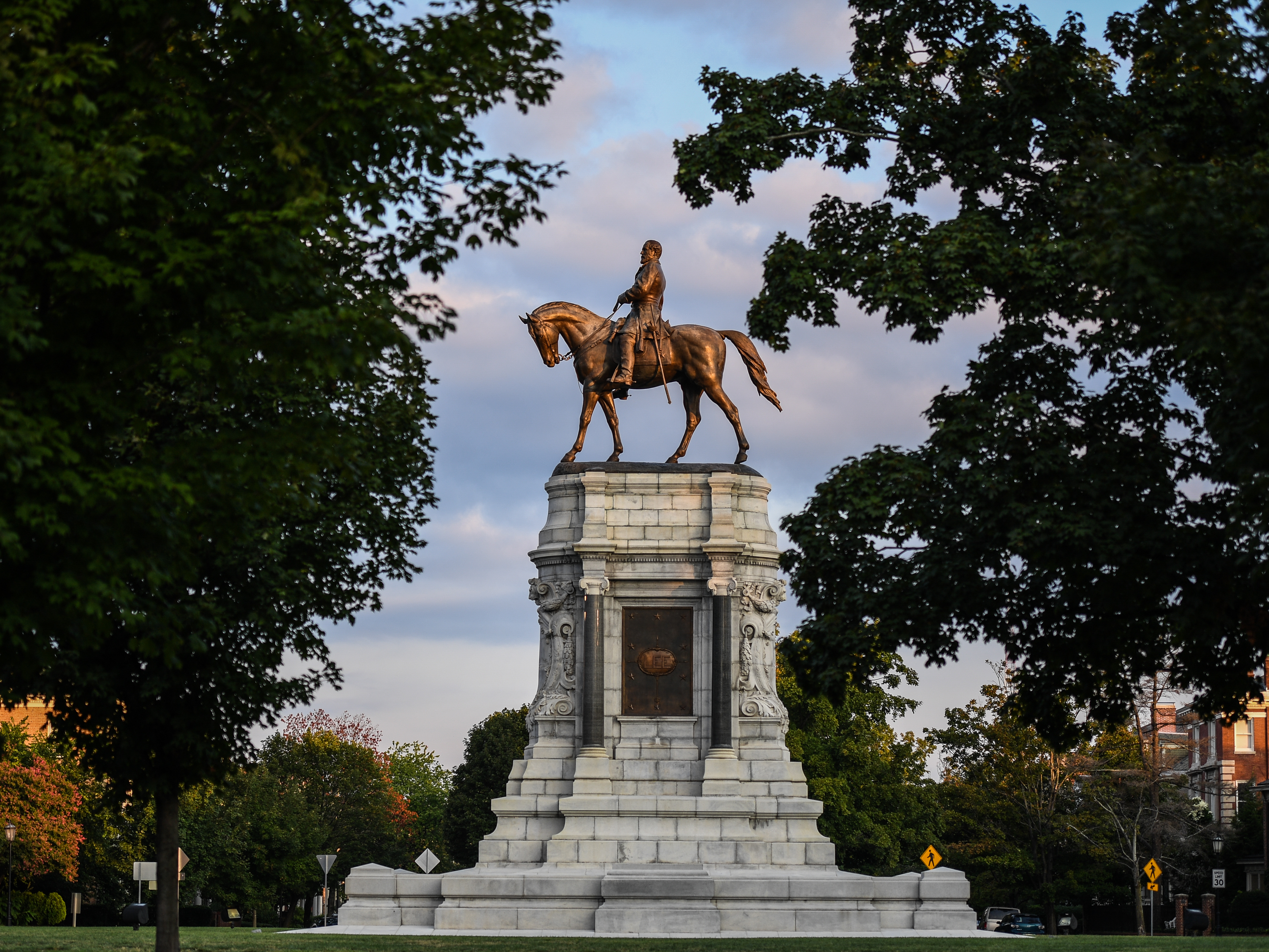 A statue of Confederate Gen. Robert E. Lee stands at the center of Lee Circle along Monument Avenue in Richmond, Va. The commonwealth of Virginia has a complicated racial history that underpins many of today's political controversies. (Getty Images)
