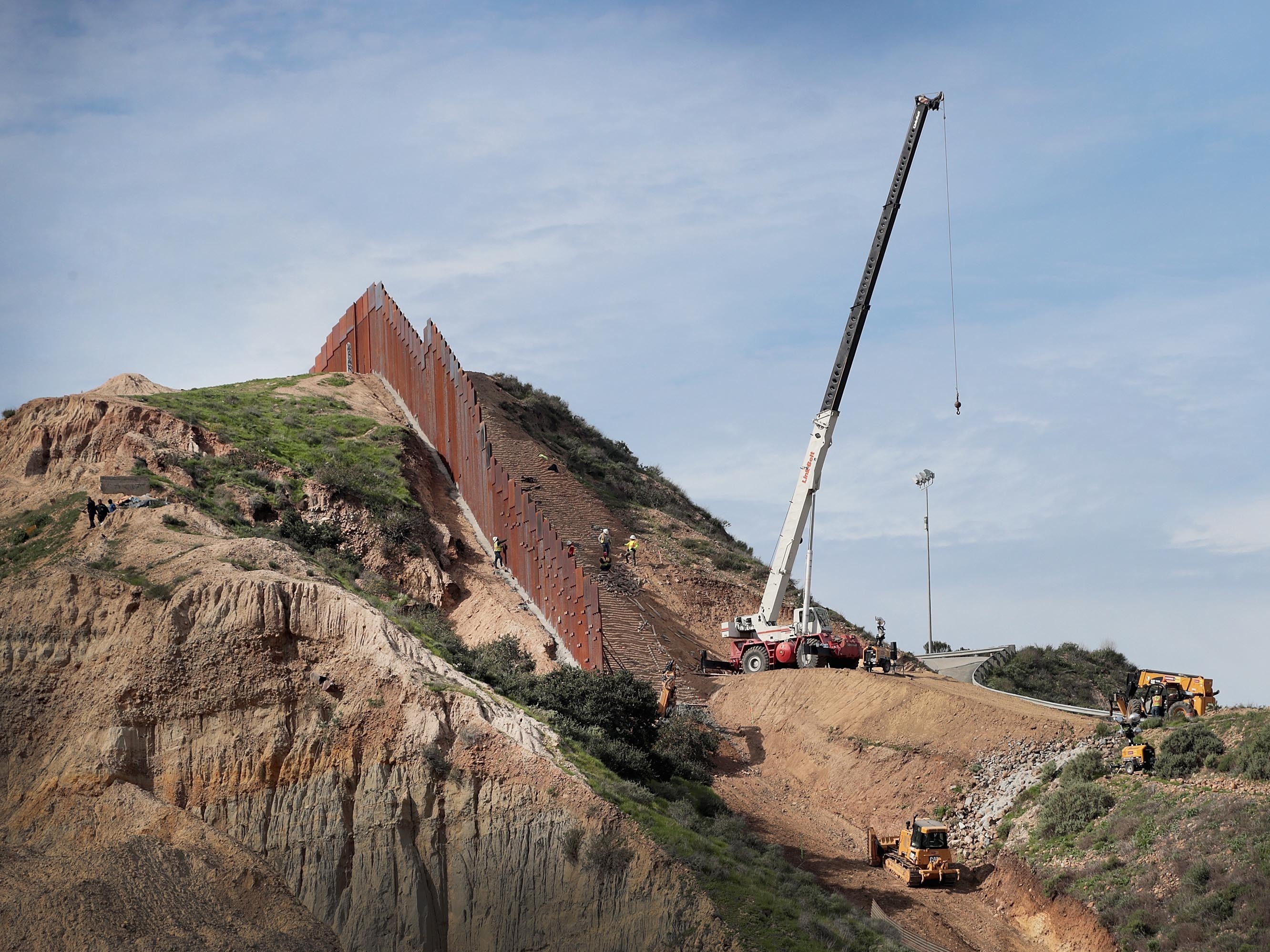A section of border wall is constructed on the U.S. side of the border on Jan. 28 in Tijuana, Mexico. Congress and President Trump continue to spar over how much additional border security funding will be allotted. (Getty Images)