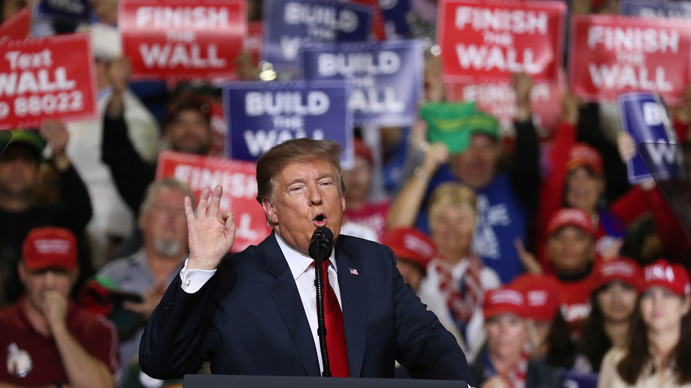 President Trump speaks during a rally Monday in El Paso, Texas, where he was greeted by a counter-rally led by Democrat Beto O'Rourke, who has criticized the president on immigration. (Getty Images)