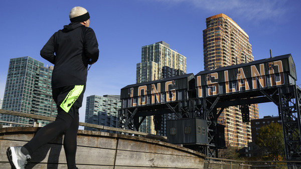 A man runs along the waterfront in the Long Island City neighborhood of the Queens borough of New York City, which had been the planned location for a secondary Amazon headquarters.
