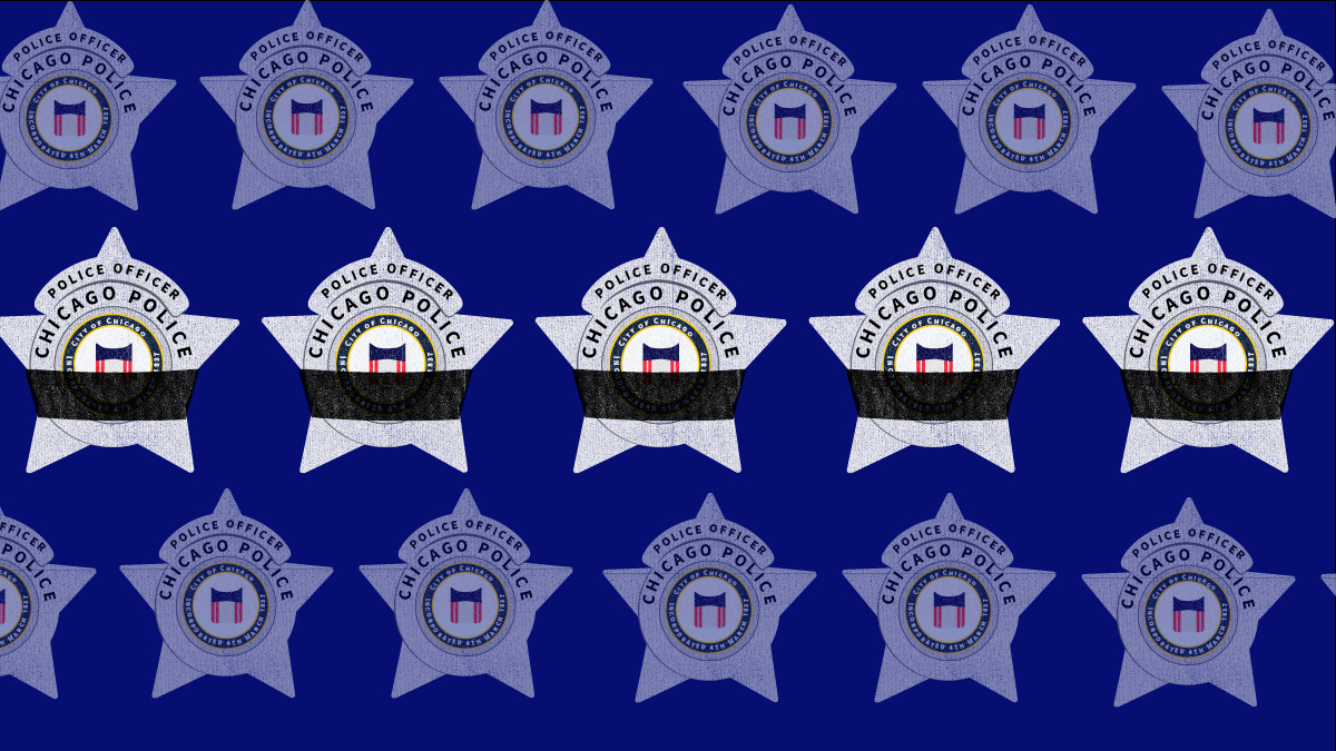 When a fellow officer dies, Chicago police wear black bands around their badges as a sign of mourning. At least five Chicago officers have taken their own lives since July. (WBEZ)