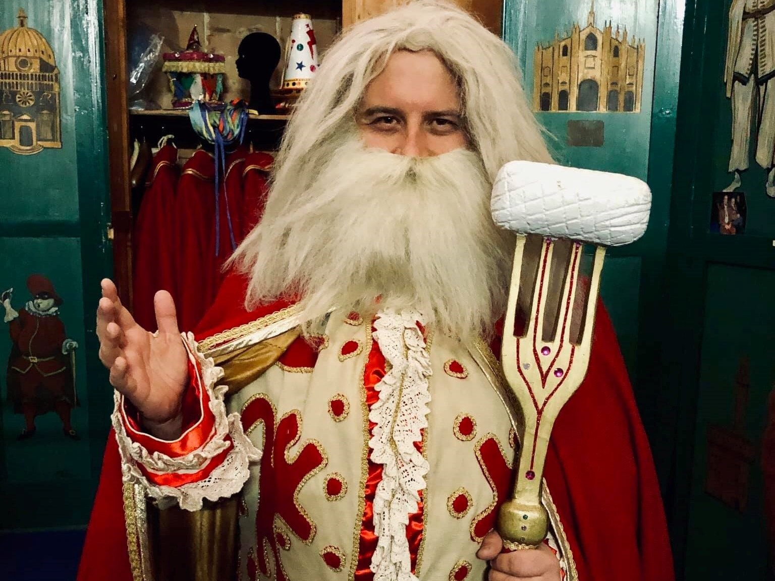Sebastiano Ridolfi tries on the costume of Papà del Gnoco, or &quot;Gnocchi Dad,&quot; the Santa-esque figure who's the symbol of the gnocchi-themed pre-Lent celebration in Verona, Italy. Although Ridolfi didn't win the election to be Papà del Gnoco, he was received warmly by the crowd and remains committed to challenging traditions. (Andrea Di Martino)