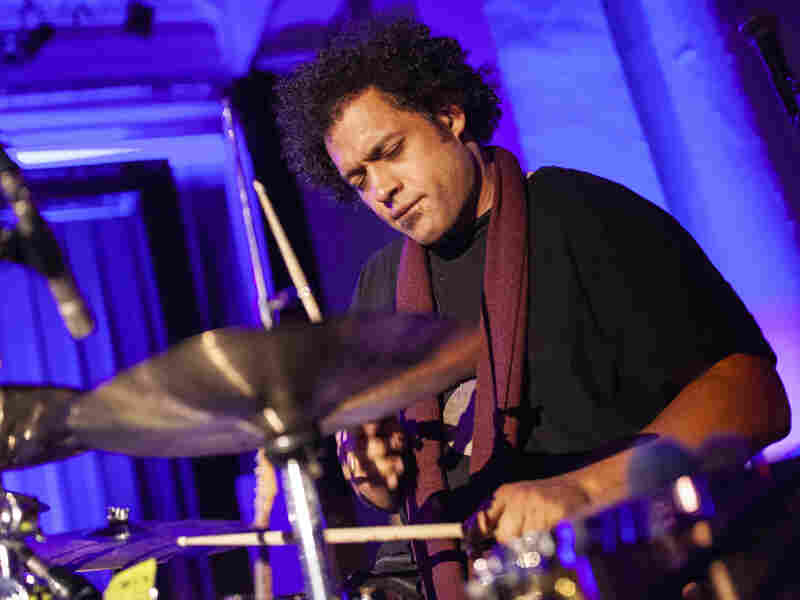 Makaya McCraven accompanies his 10 piece ensemble at Paul Robeson Theatre in the historical South Shore Cultural Center in Chicago, USA