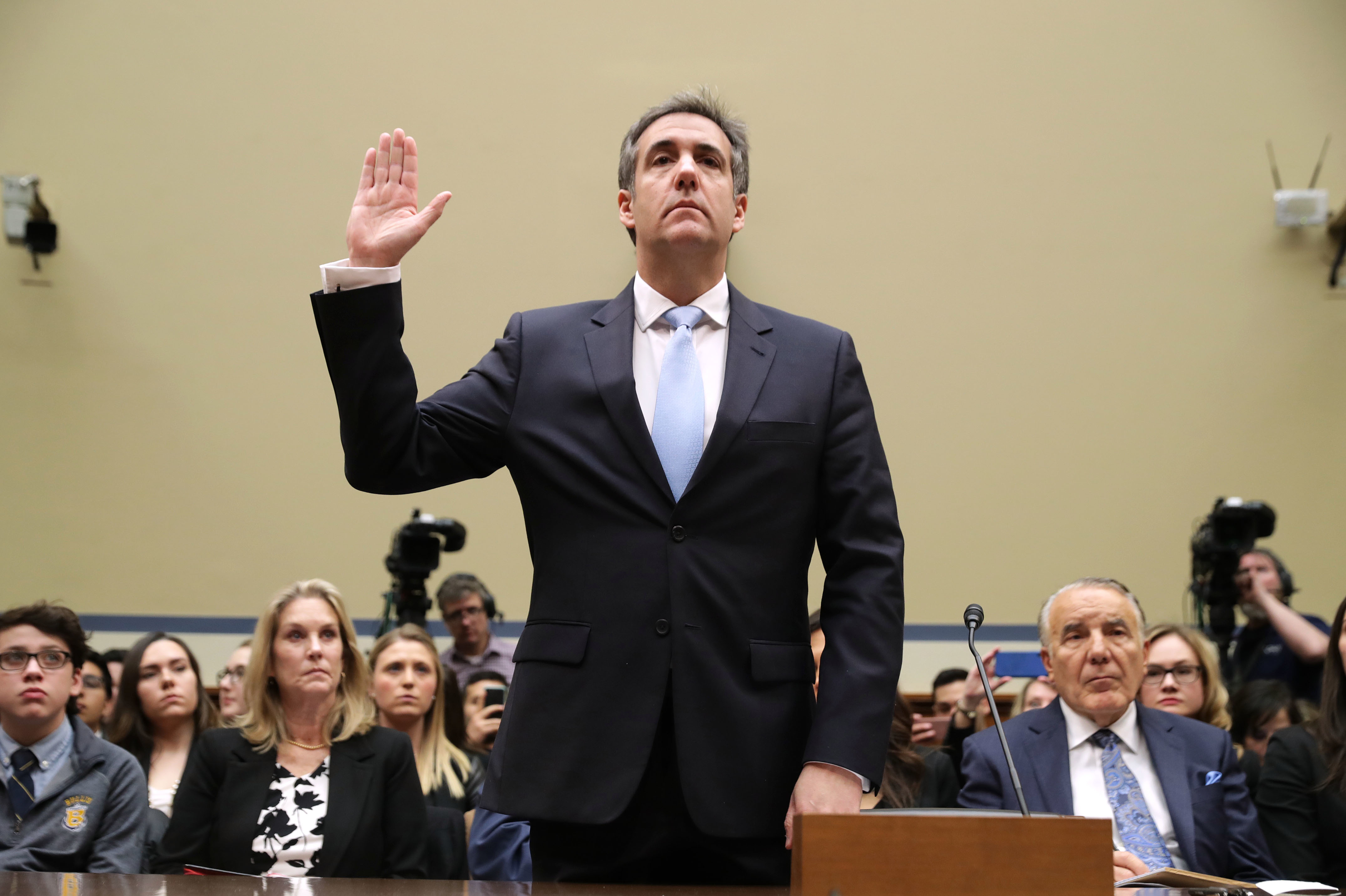 Michael Cohen, former attorney and fixer for President Trump, testifies before the House Oversight and Government Reform Committee on Wednesday. (Getty Images)