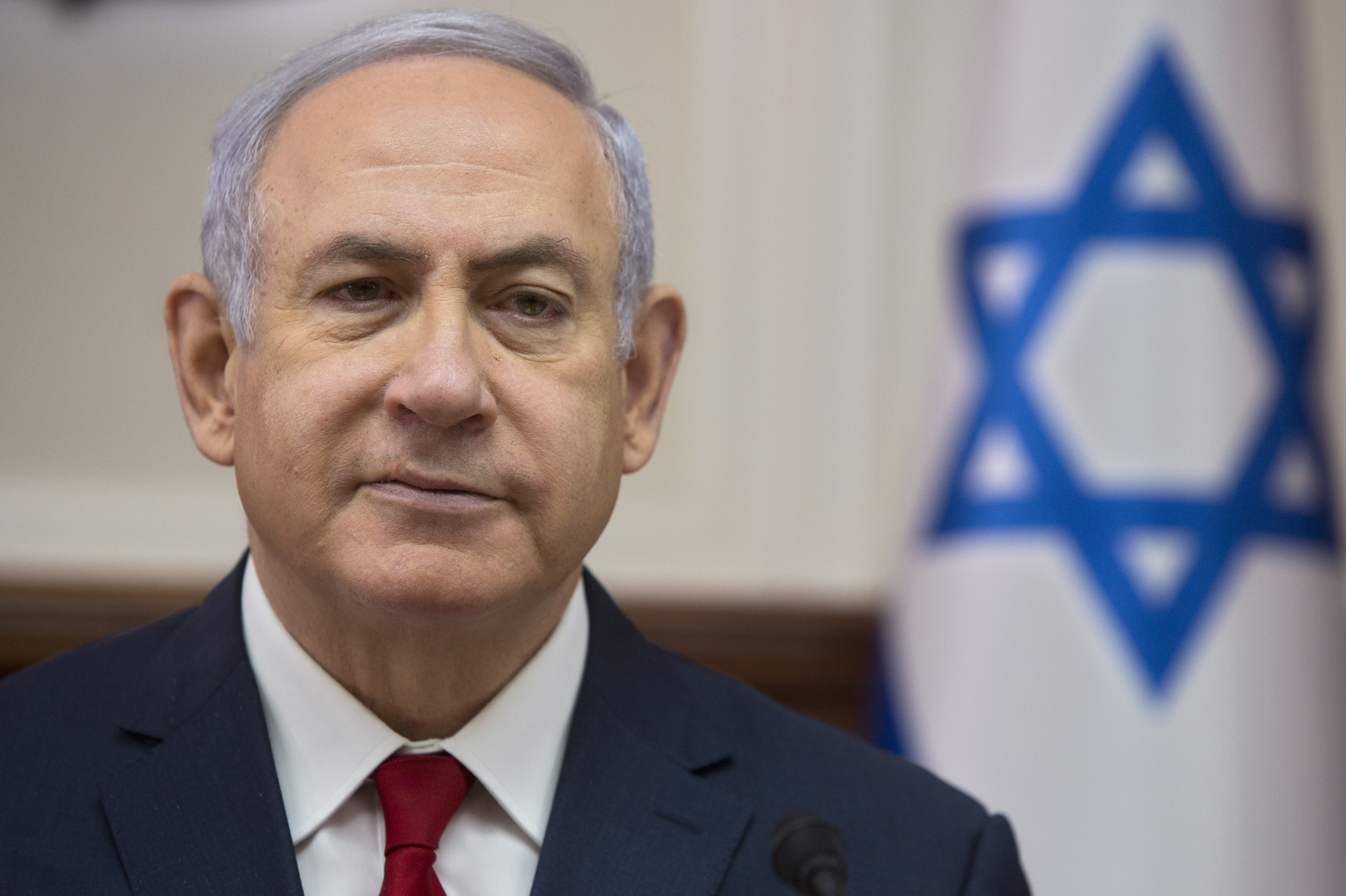 Israel's attorney general says he is taking steps to indict Israeli Prime Minister Benjamin Netanyahu, shown here earlier this month, on corruption charges.