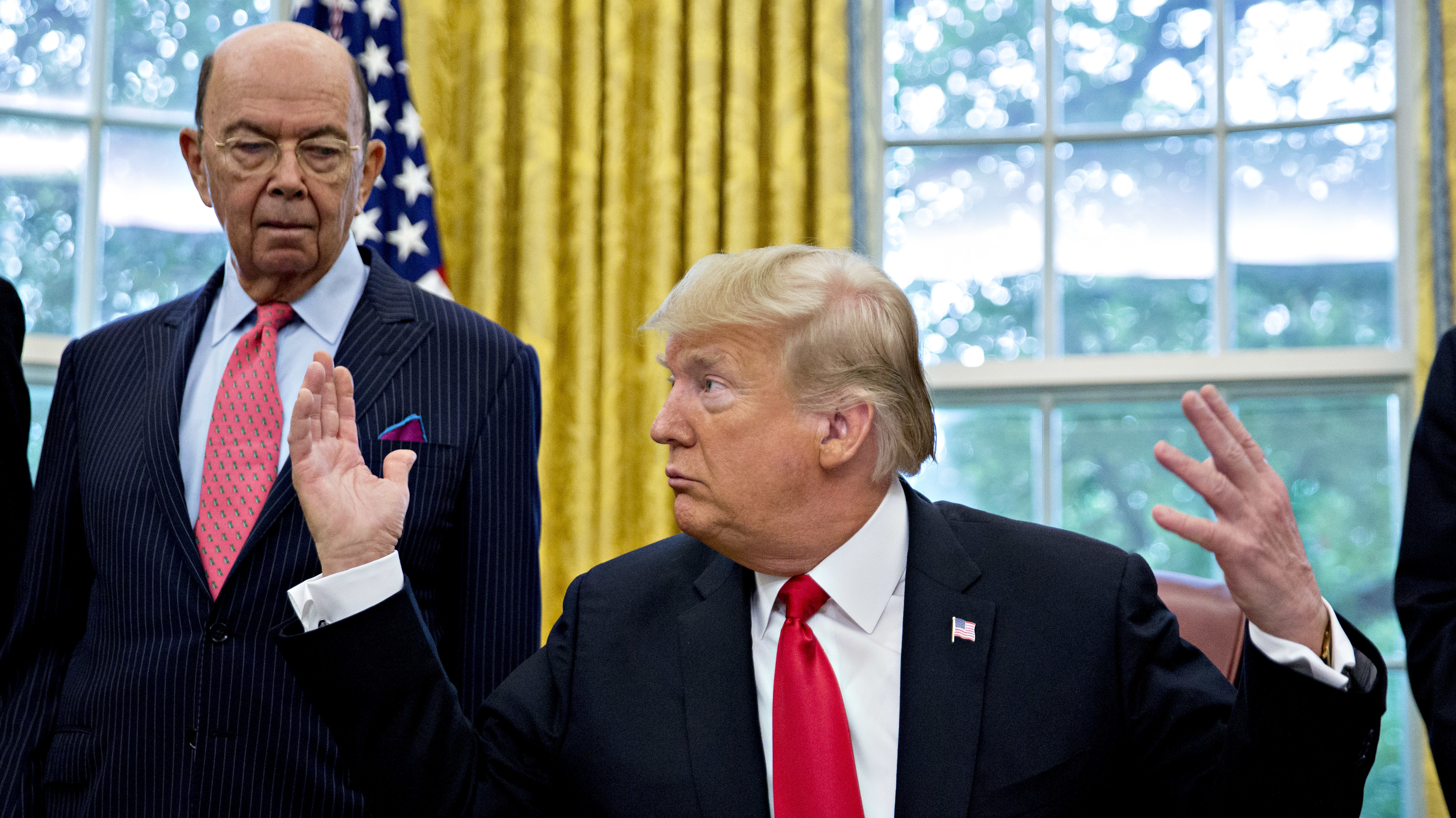 Commerce Secretary Wilbur Ross, with President Trump at the White House in 2018,  approved adding to the 2020 census a question asking, &quot;Is this person a citizen of the United States?&quot; (Bloomberg via Getty Images)
