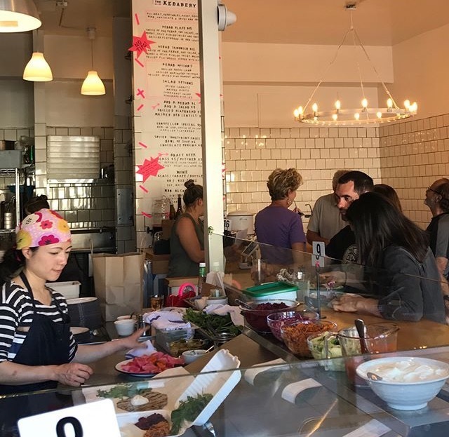 Allison Hopelain, owner of The Kebabery in Oakland, Calif., says the cafeteria-style restaurant reflects the changing tastes of customers who now want to grab a quick, affordable meal and head back to their lives. (Courtesy of The Kebabery)