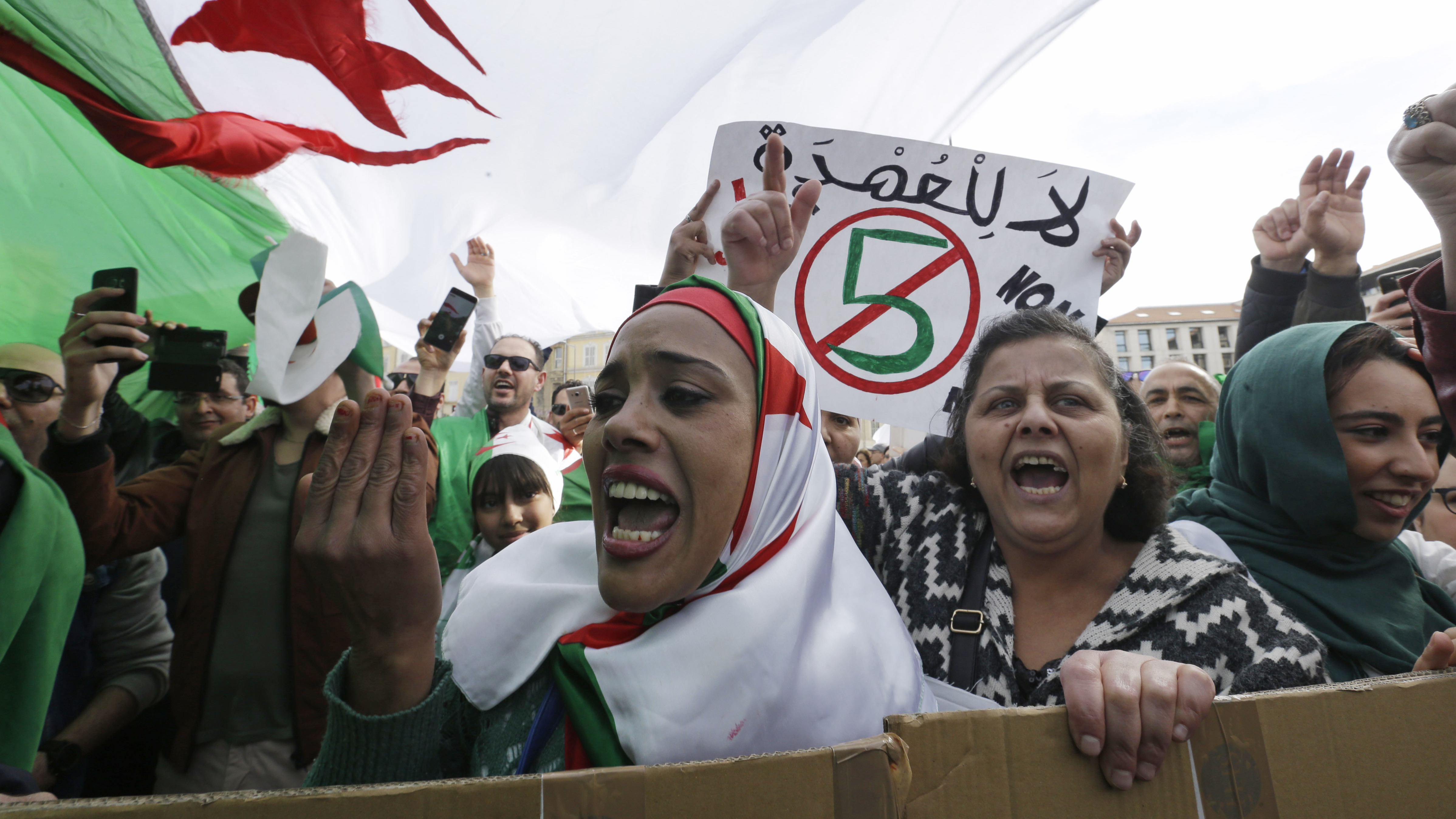 Demonstrators stage a protest against President Abdelaziz Bouteflika