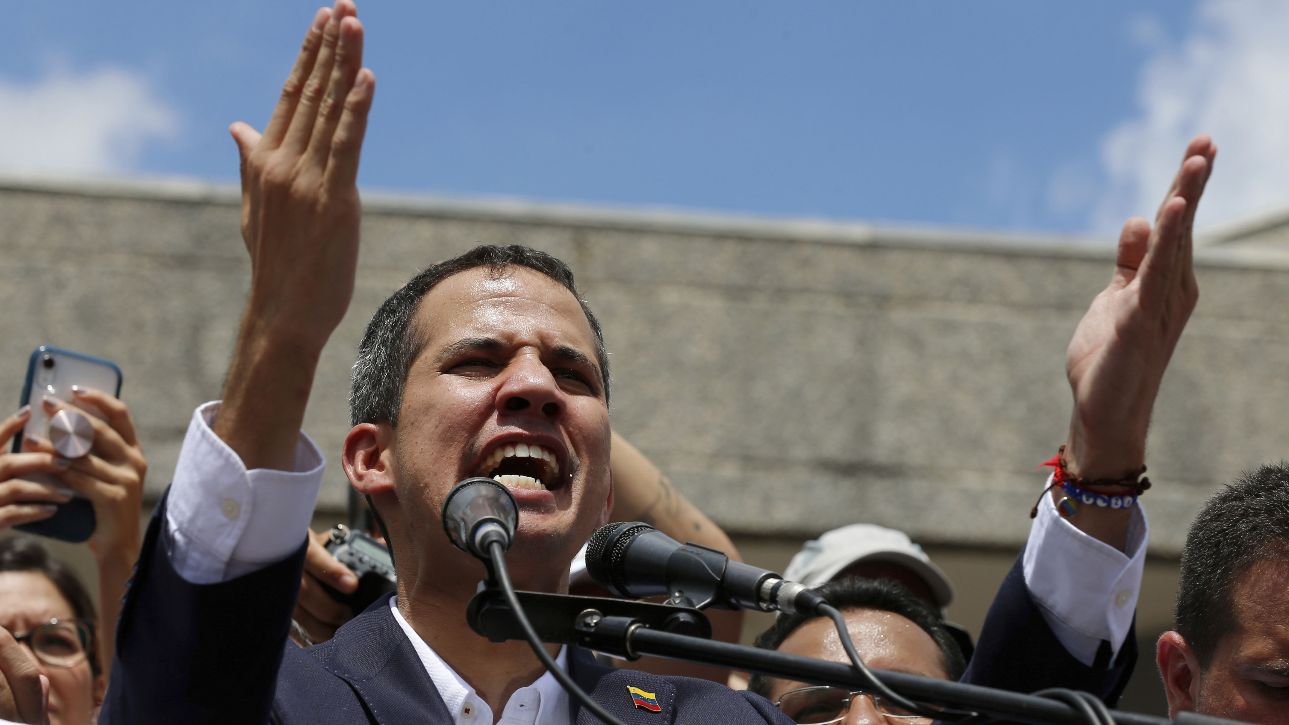 Venezuelan opposition leader Juan Guaidó speaks during a rally demanding the resignation of Venezuelan President Nicolas Maduro in Caracas on Monday.