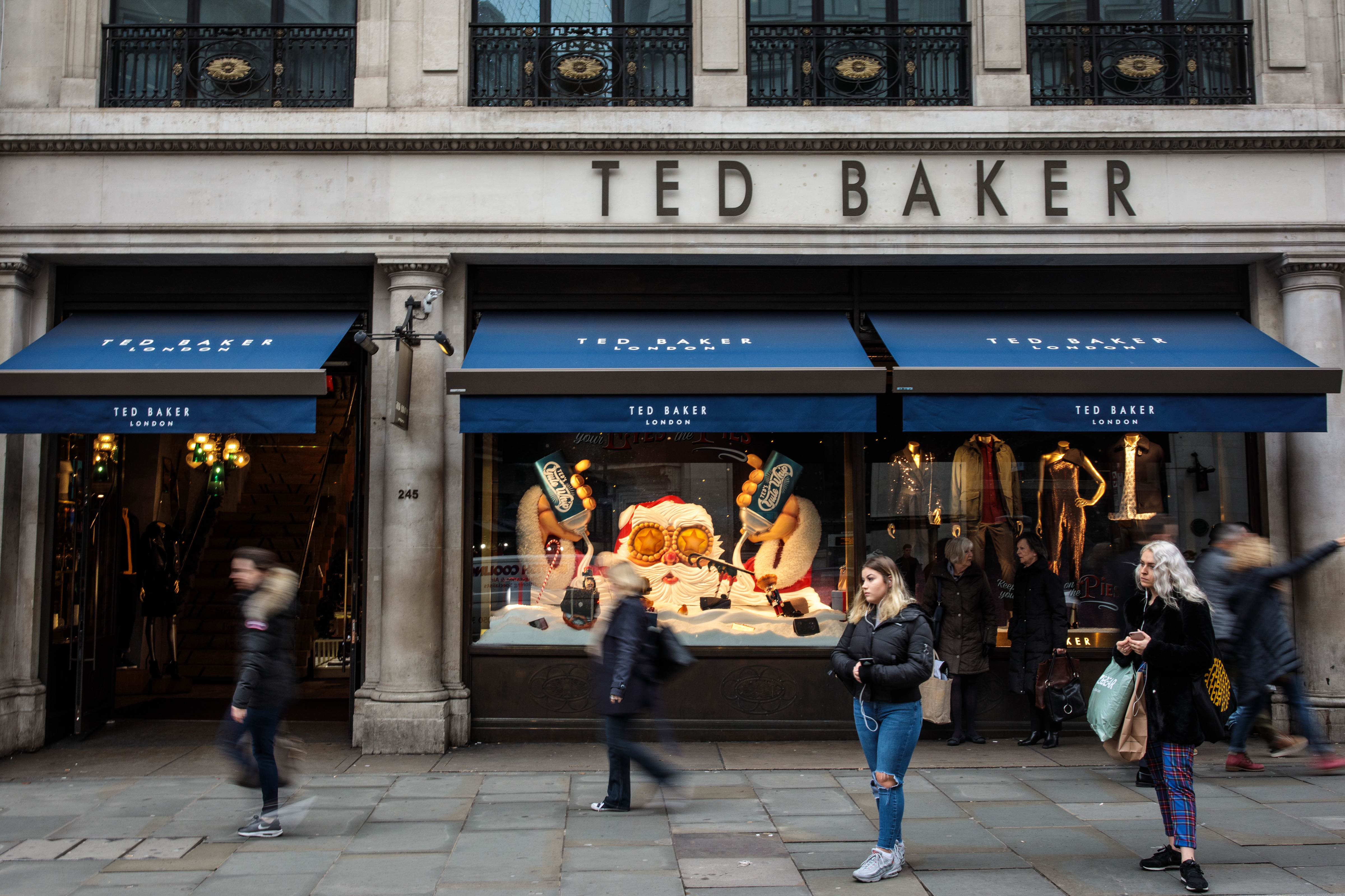 A branch of Ted Baker stands on Regent Street in London, England. Ted Baker's CEO Ray Kelvin resigned after people who worked with him complained of &quot;forced hugging.&quot; (Getty Images)