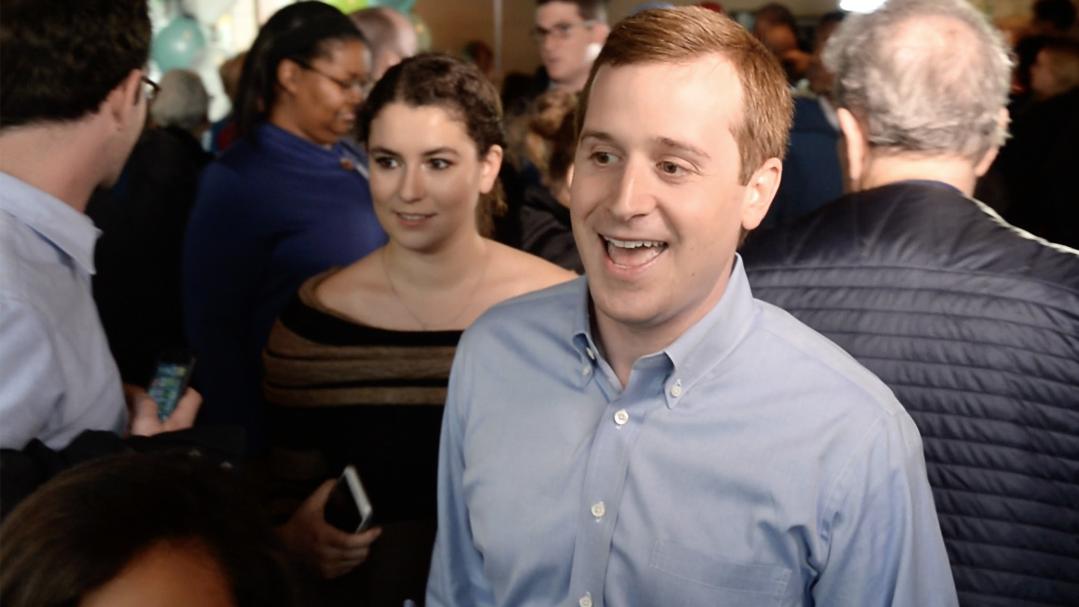 Democrat Dan McCready makes his way through the crowd at an event following the North Carolina State Board of Elections decision to hold a new election in the state's ninth congressional district. (The Charlotte Observer via Getty Images)