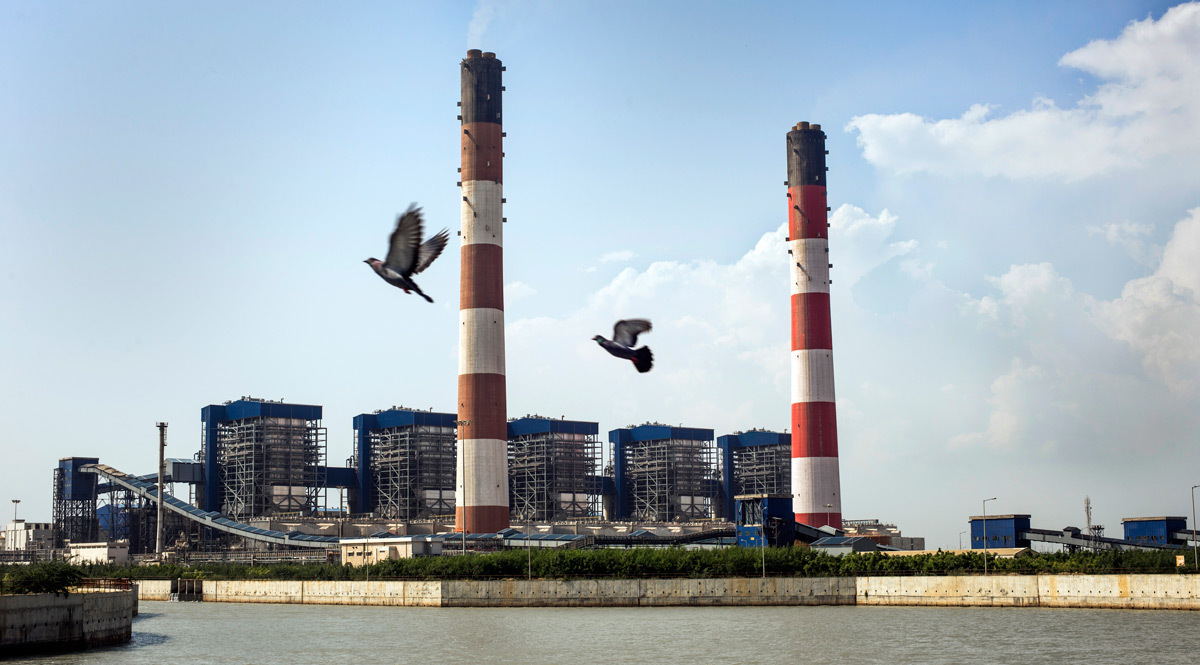 The coal-fired Tata Mundra power plant in western India was funded by a branch of the World Bank. A group of farmers and fishermen is suing, claiming that contamination of local water sources has disrupted their livelihoods.