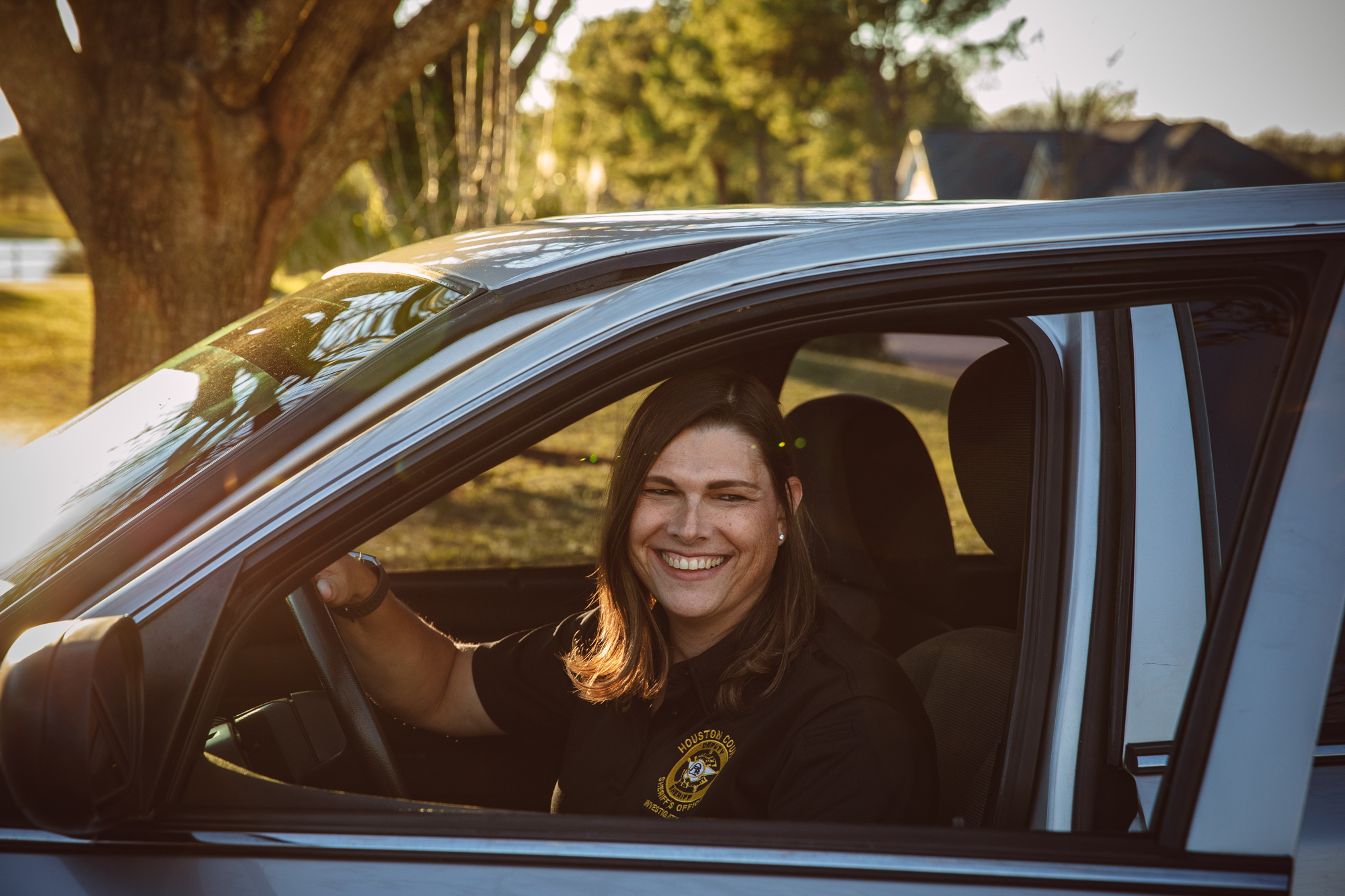 Anna Lange, who works for the sheriff's office in Houston County, Ga., discovered that her health insurance plan excludes transgender services. She is seeking to challenge that policy. (Audra Melton for NPR)