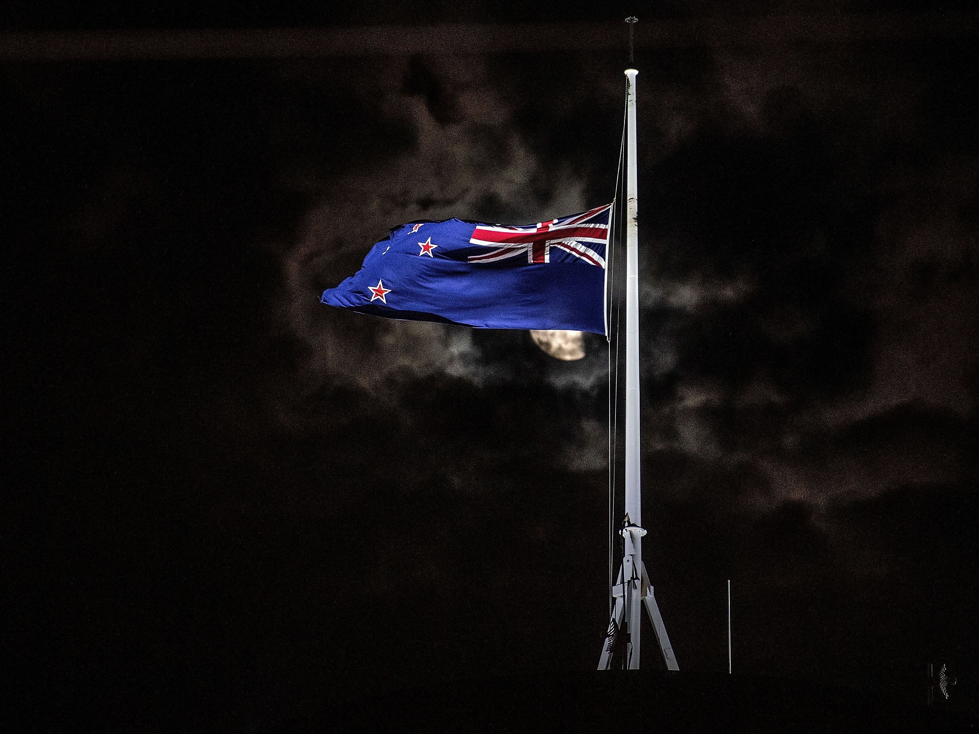 New Zealand's flag is flown at half-staff on a Parliament building in Wellington on Friday after the shootings in Christchurch. (AFP/Getty Images)