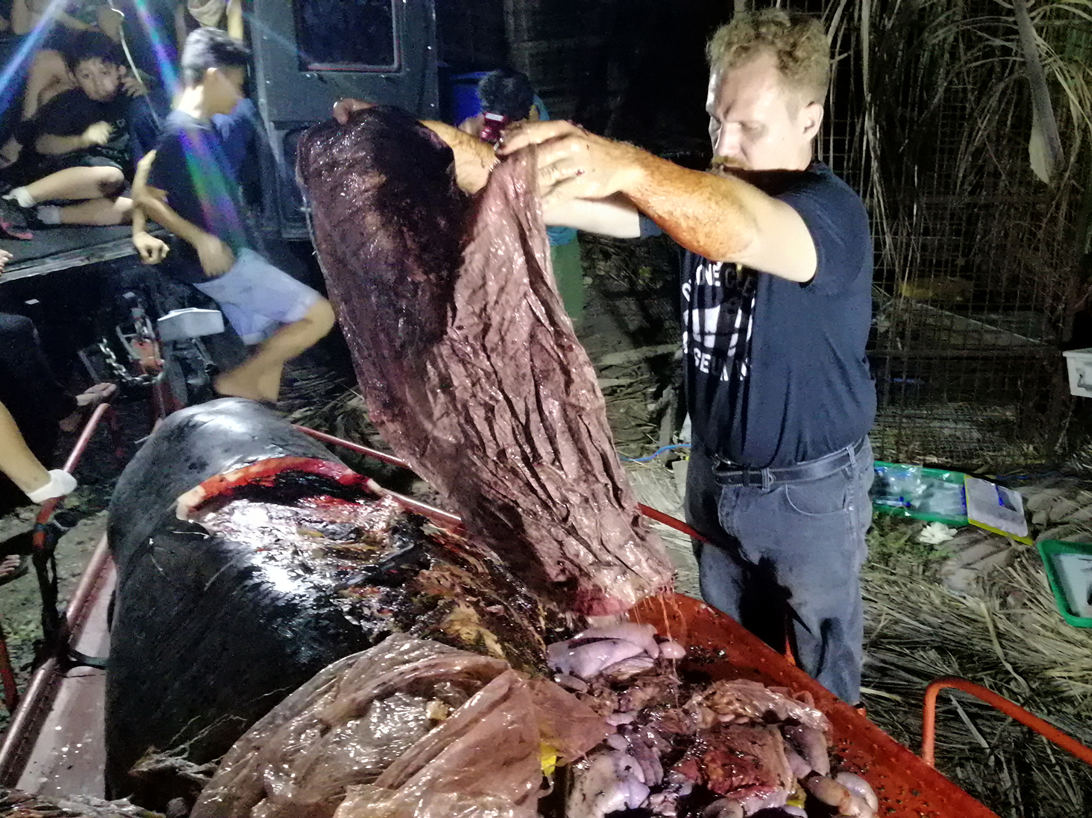 Darrell Blatchley, environmentalist and director of D' Bone Collector Museum, shows plastic waste found in the stomach of a Cuvier's beaked whale near the Philippine city of Davao. (AFP/Getty Images)