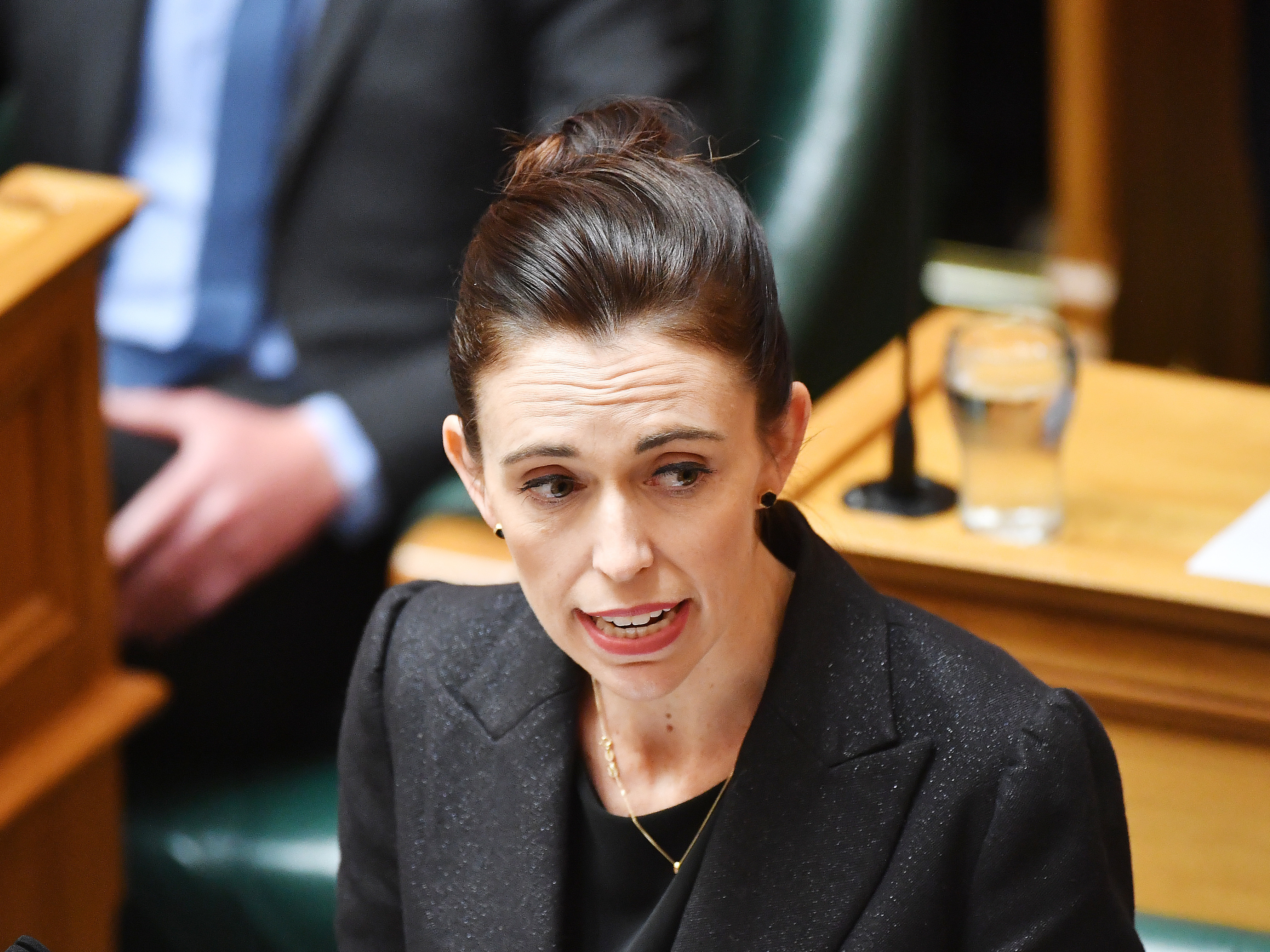 Prime Minister Jacinda Ardern speaks to the parliament Tuesday as New Zealand considers new gun laws after the mass shooting in that stunned the country. (Getty Images)