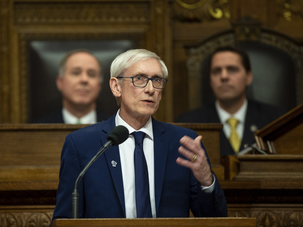 Wisconsin Gov. Tony Evers, a Democrat, delivers the State of the State address on Jan. 22. On Thursday, a Wisconsin county judge restored the governor's powers that had been restricted by Republicans during a lame-duck session.