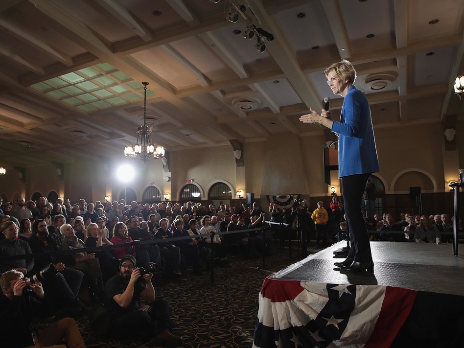 While Sen. Elizabeth Warren, seen speaking in Iowa, may be dominating the policy debate, there is little evidence that voters are rewarding politicians who flesh out their plans over others with strong personal brands.