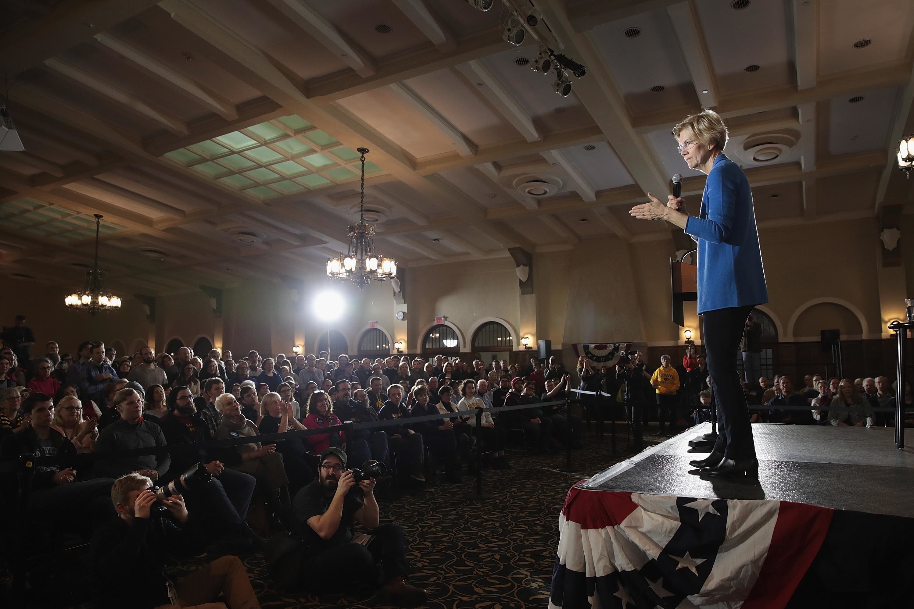 While Sen. Elizabeth Warren, seen speaking in Iowa, may be dominating the policy debate, there is little evidence that voters are rewarding politicians who flesh out their plans over others with strong personal brands. (Getty Images)
