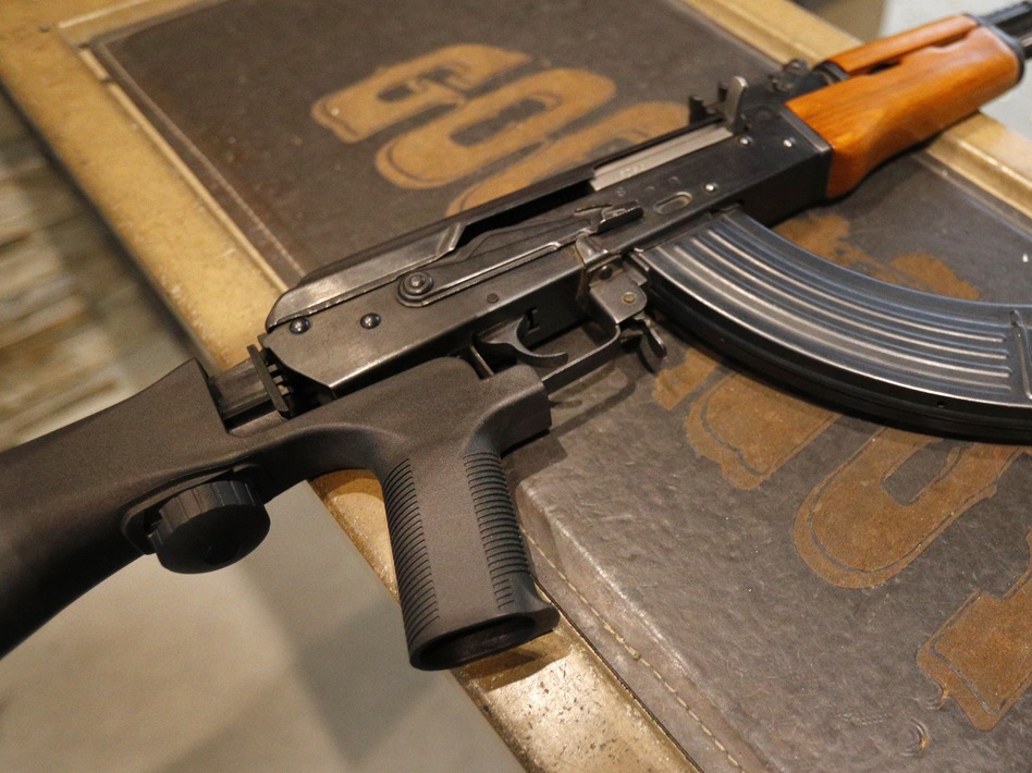 Bump stocks like this one installed on an AK-47 are now illegal in the U.S., after the Trump administration changed how they are legally defined. The devices can allow a semi-automatic rifle to fire nearly as fast as a machine gun.