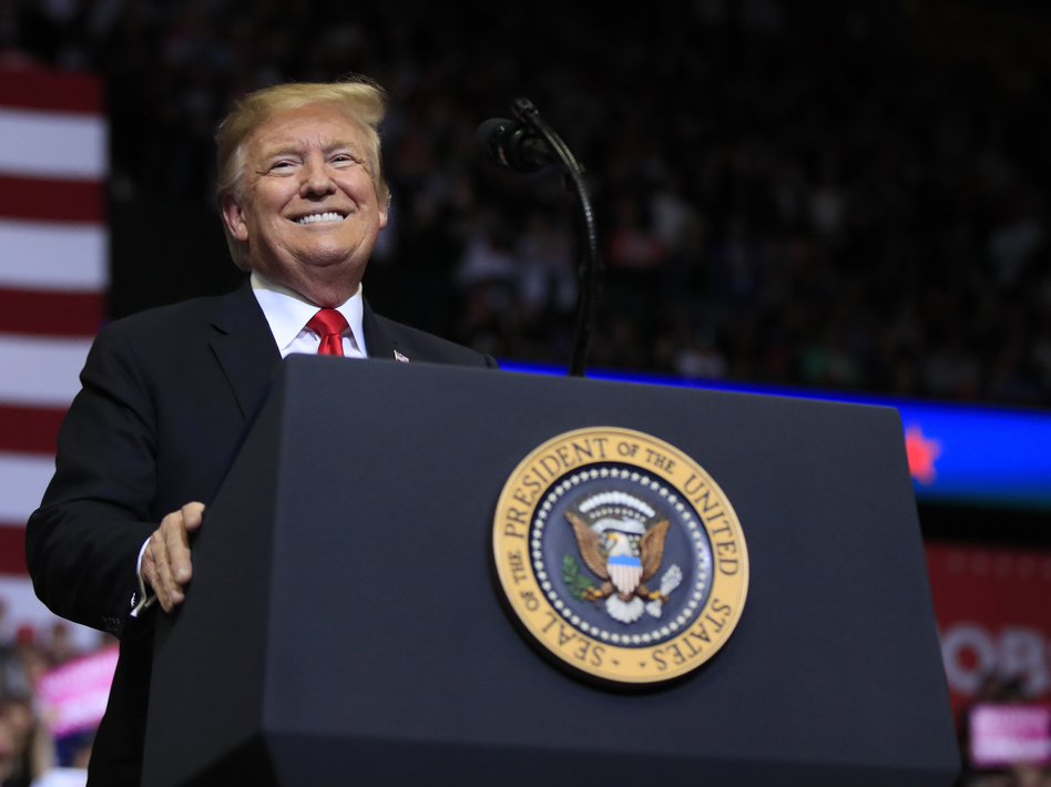 President Trump speaks to supporters during a rally at the Van Andel Arena Thursday in Grand Rapids, Mich.
