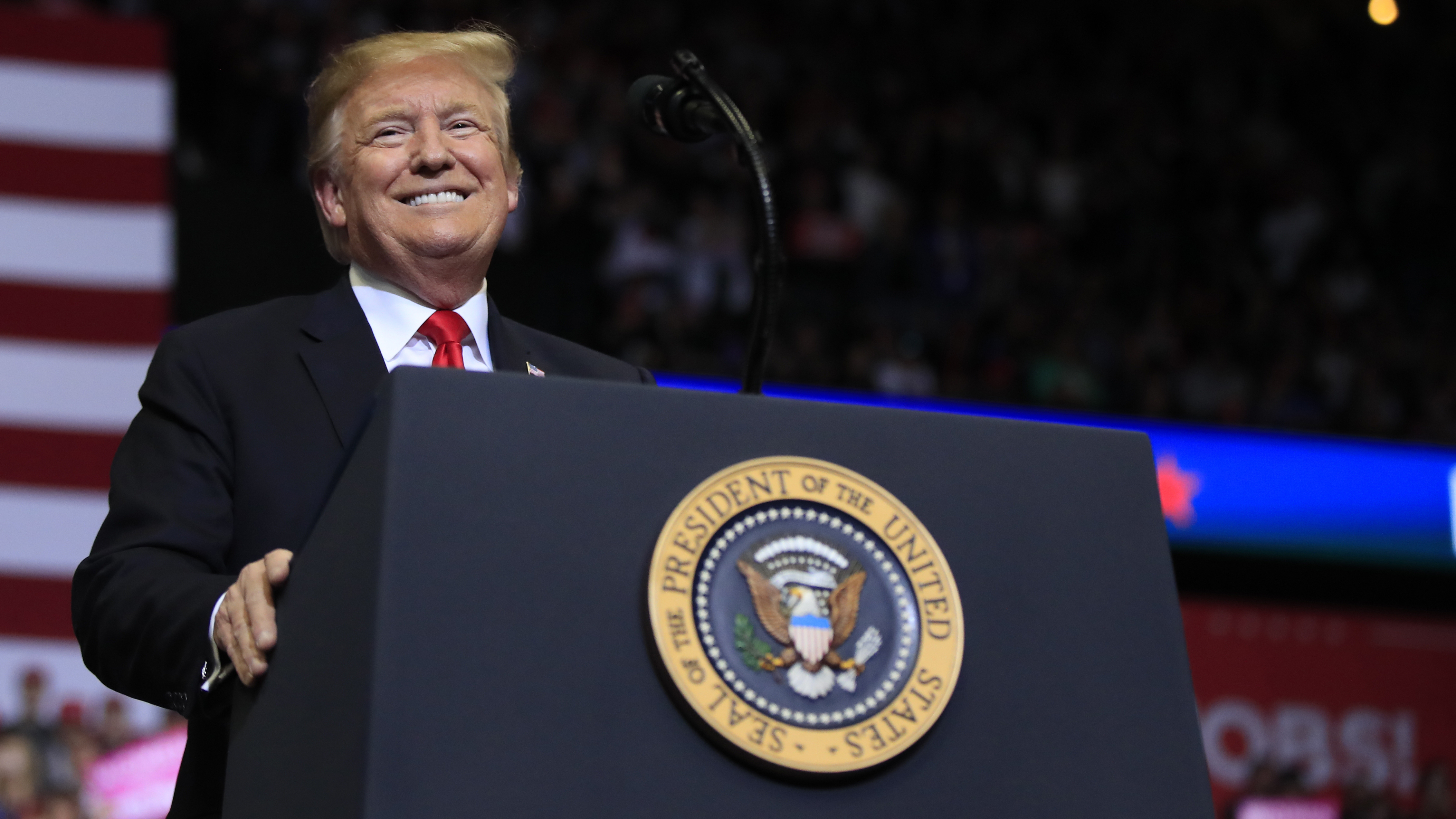 President Trump speaks to supporters during a rally at the Van Andel Arena Thursday in Grand Rapids, Mich.