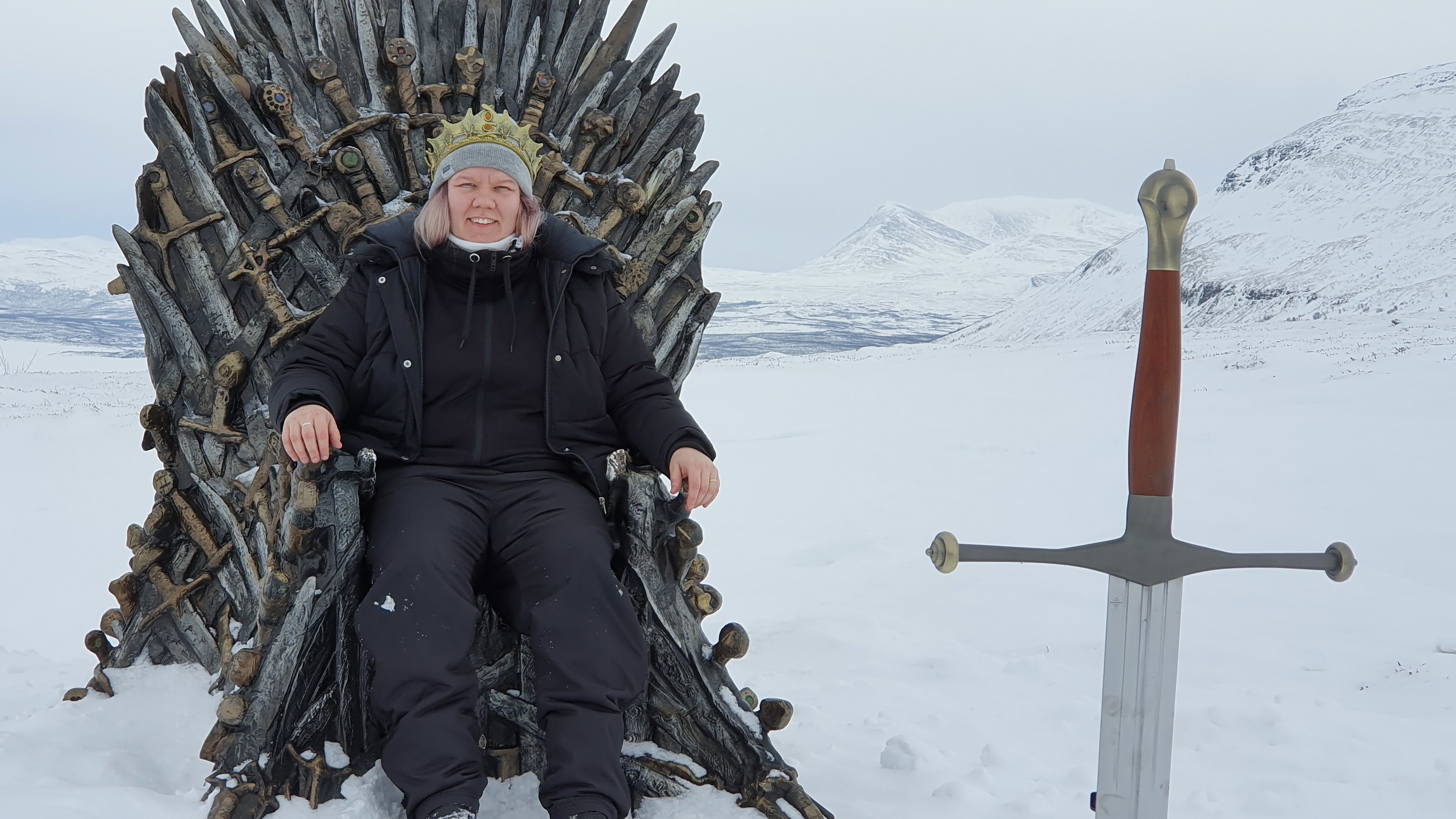 Josefine Wallenå of Sweden sits on the Iron Throne after driving eight hours to find it. (Courtesy of Josefine Wallenå)
