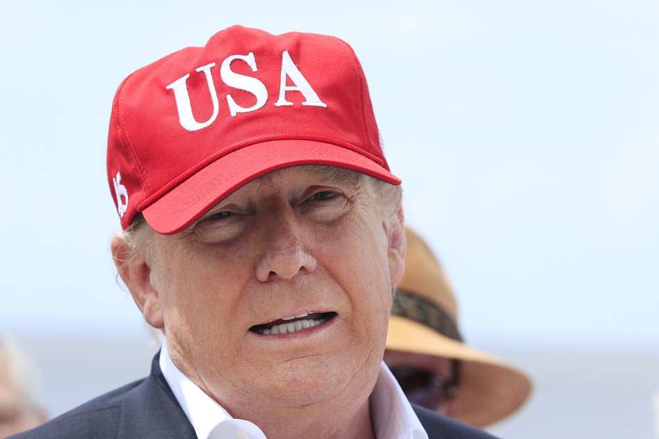 President Trump says he will close the United States' Southern border, or large sections of it, next week if Mexico does not immediately stop illegal immigration. Here Trump speaks to reporters during a visit to Lake Okeechobee and Herbert Hoover Dike at Canal Point, Fla., on Friday. (Manuel Balce Ceneta/AP)