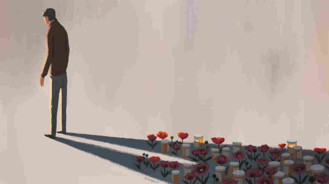 Man standing, opioids in shadow.